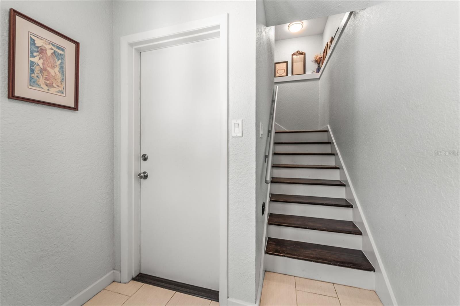 Door Leading to Garage (1st Floor) and Stairs leading to 2nd Floor Main Living Area