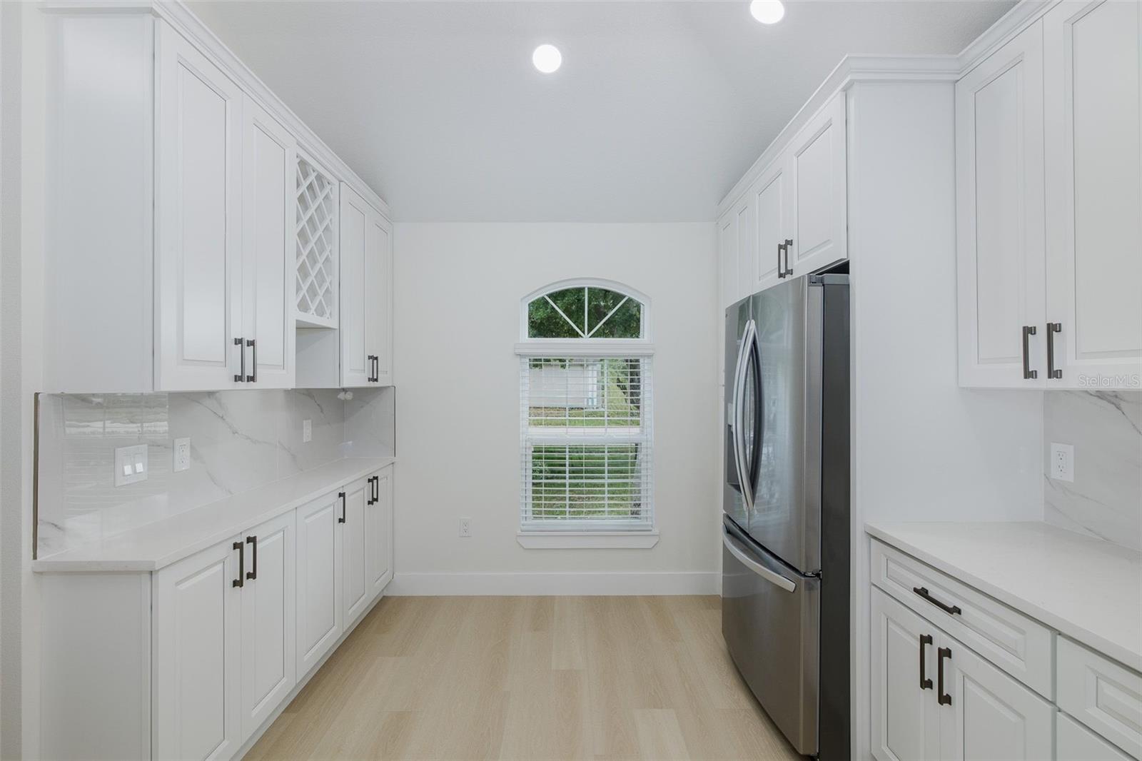 Kitchen featuring Beverage Bar