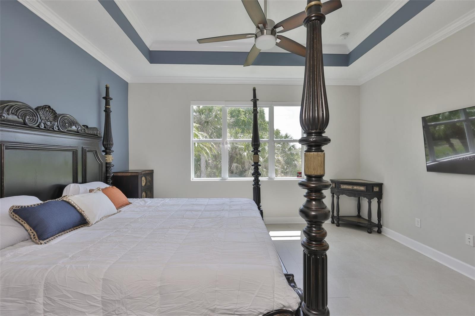 Windows are large with electronic blinds.