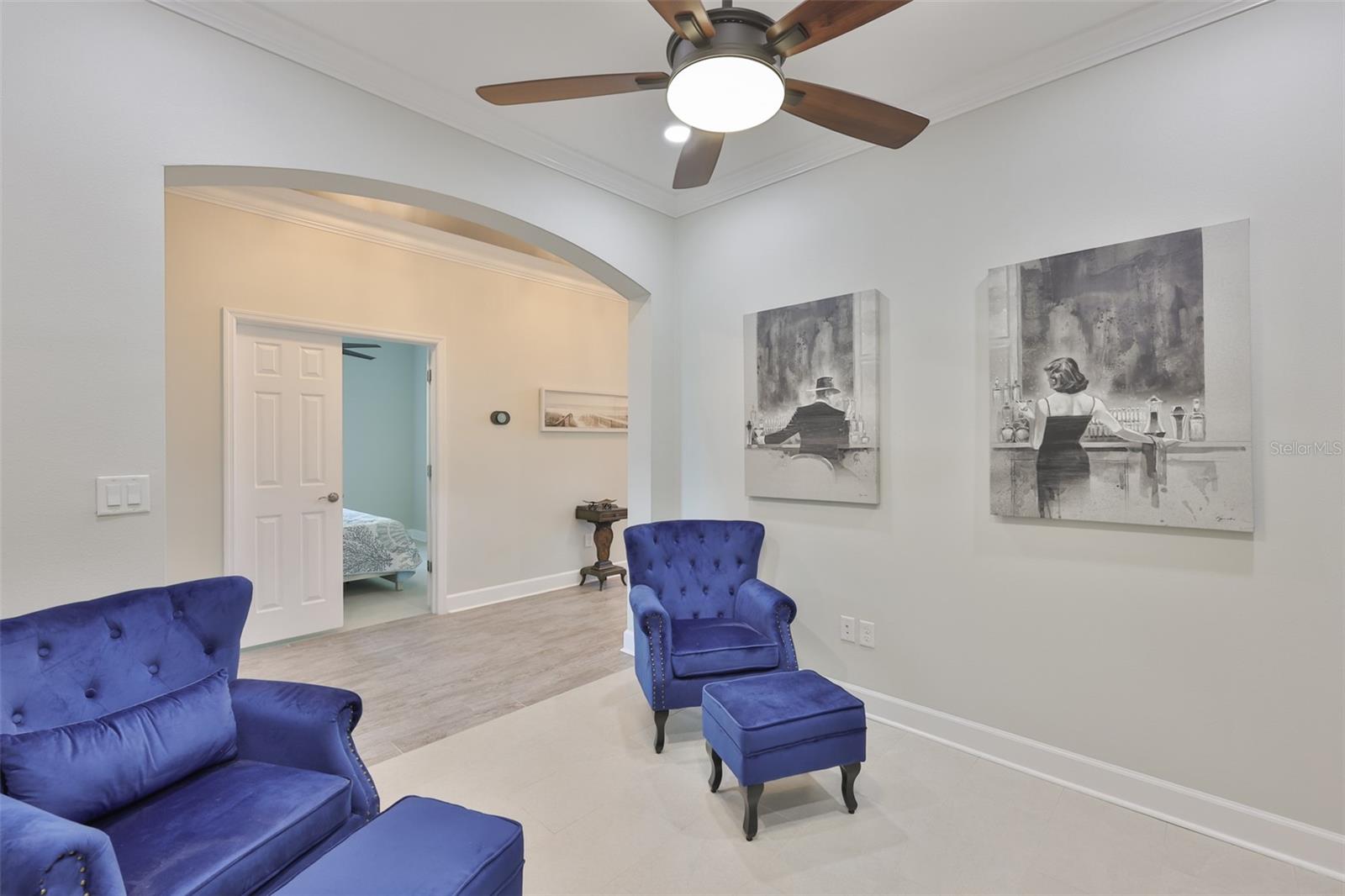 The arched doorways add a sophistication to the home along with an open feel.