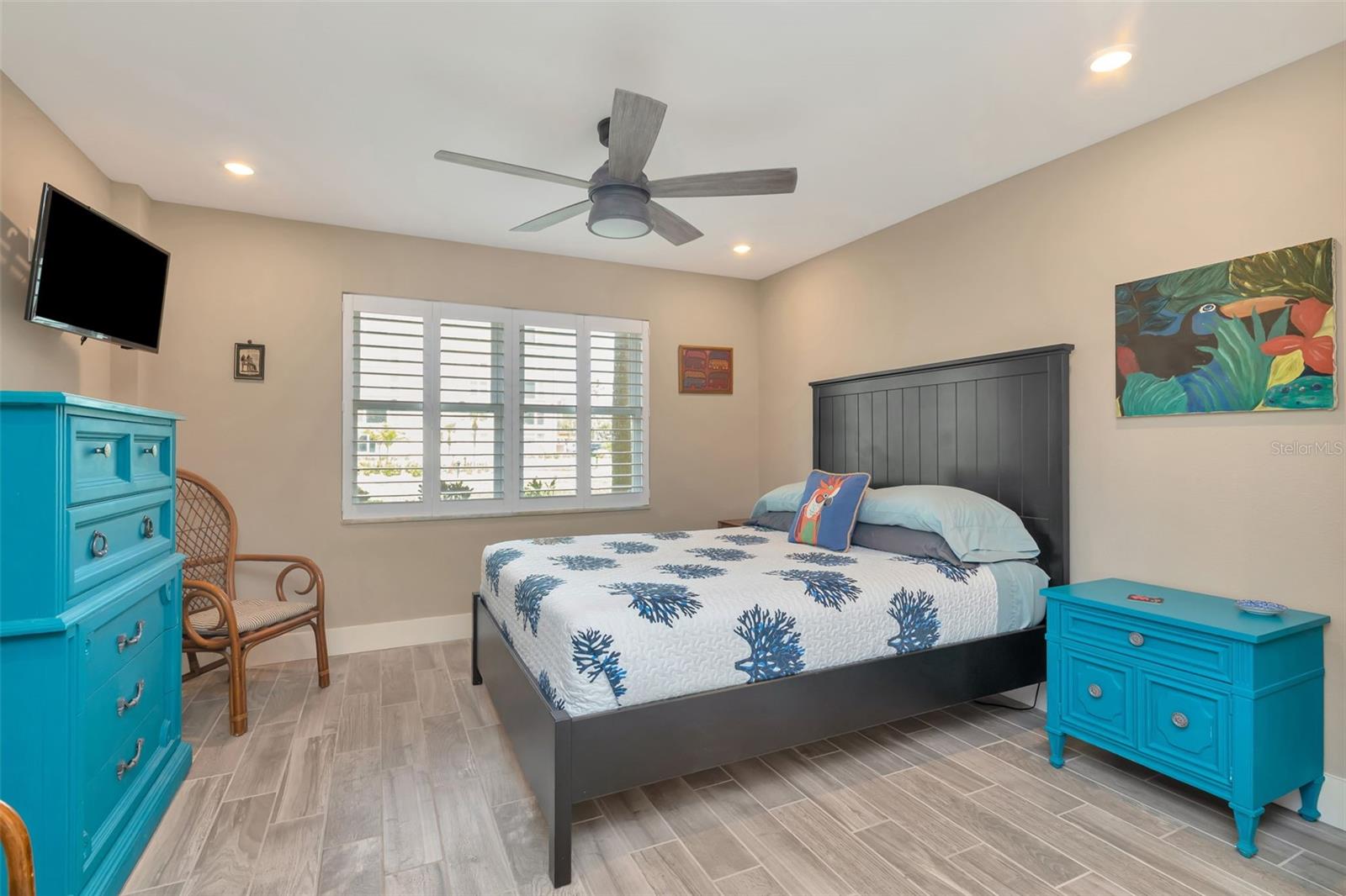 Primary bedroom overlooking the pool