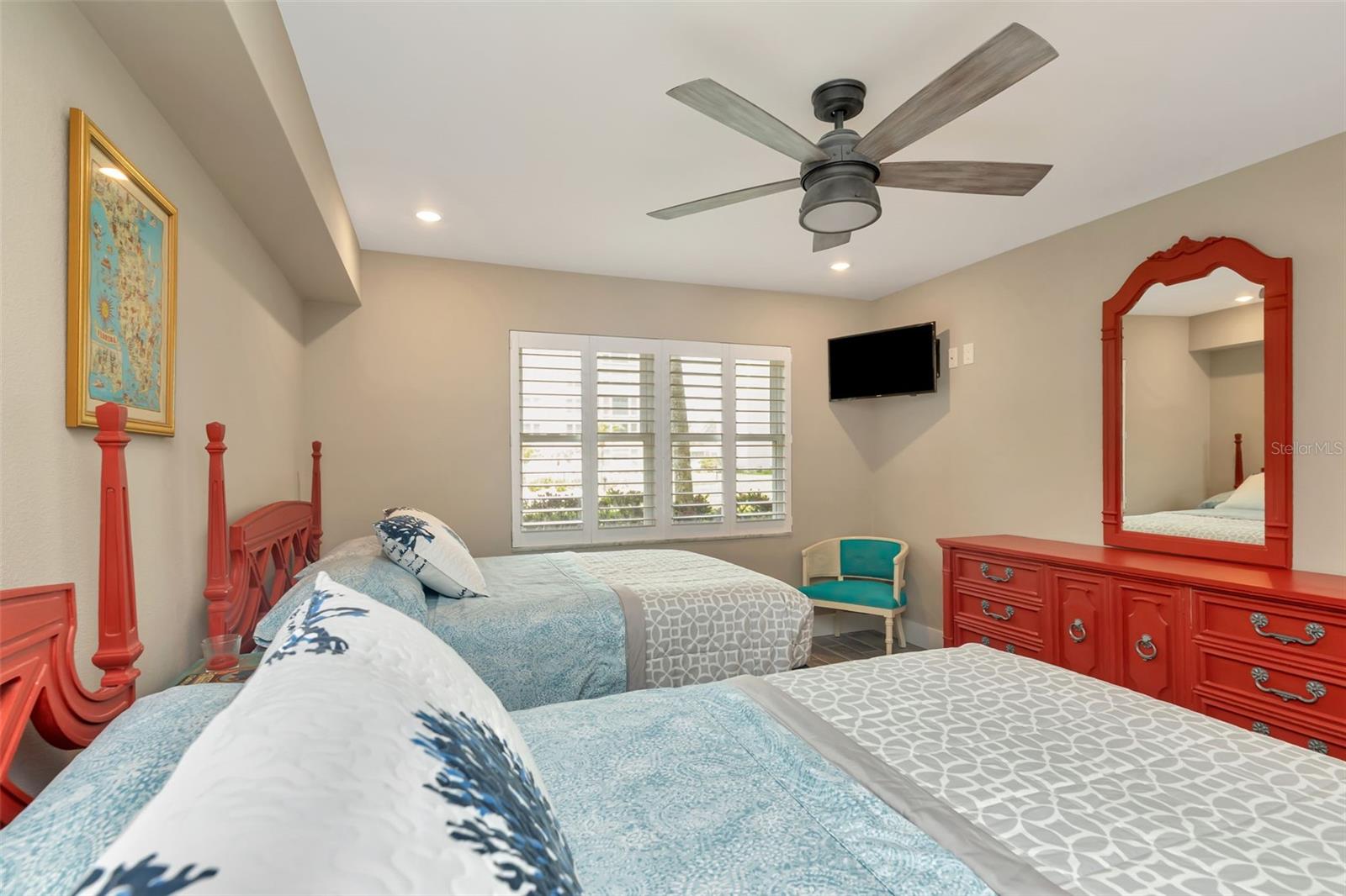 Guest bedroom overlooks the pool