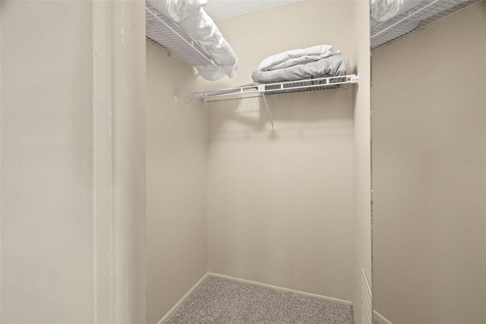 Primary Bedroom walk-in closet