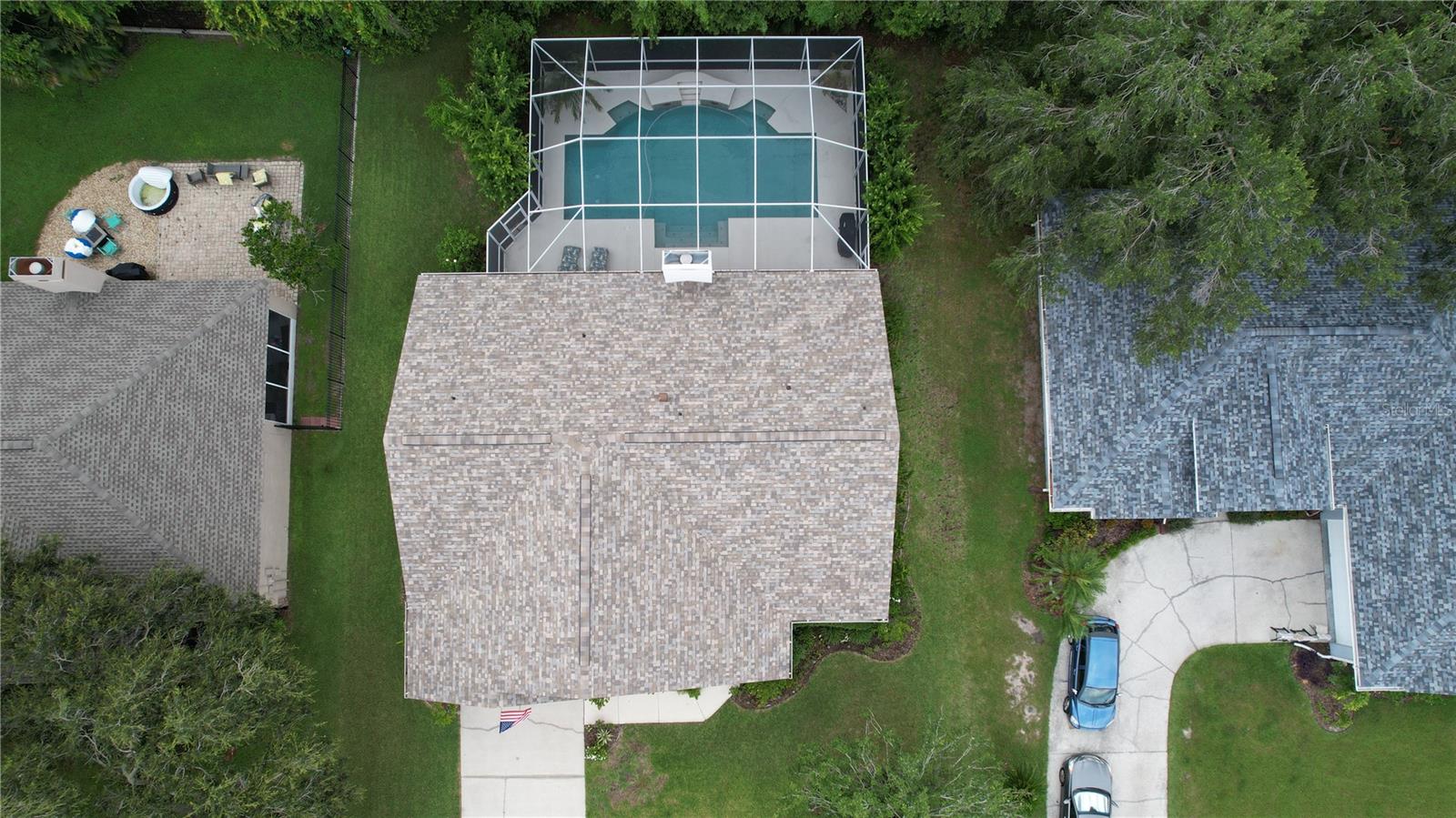 Aerial View- notice the side yard with some elbow room, and just look at that POOL