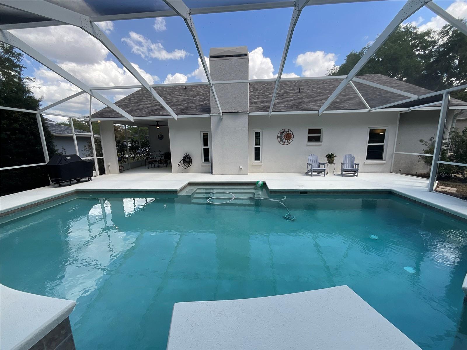 LOOK at the length of this pool!  Almost the length of the entire back of the house!