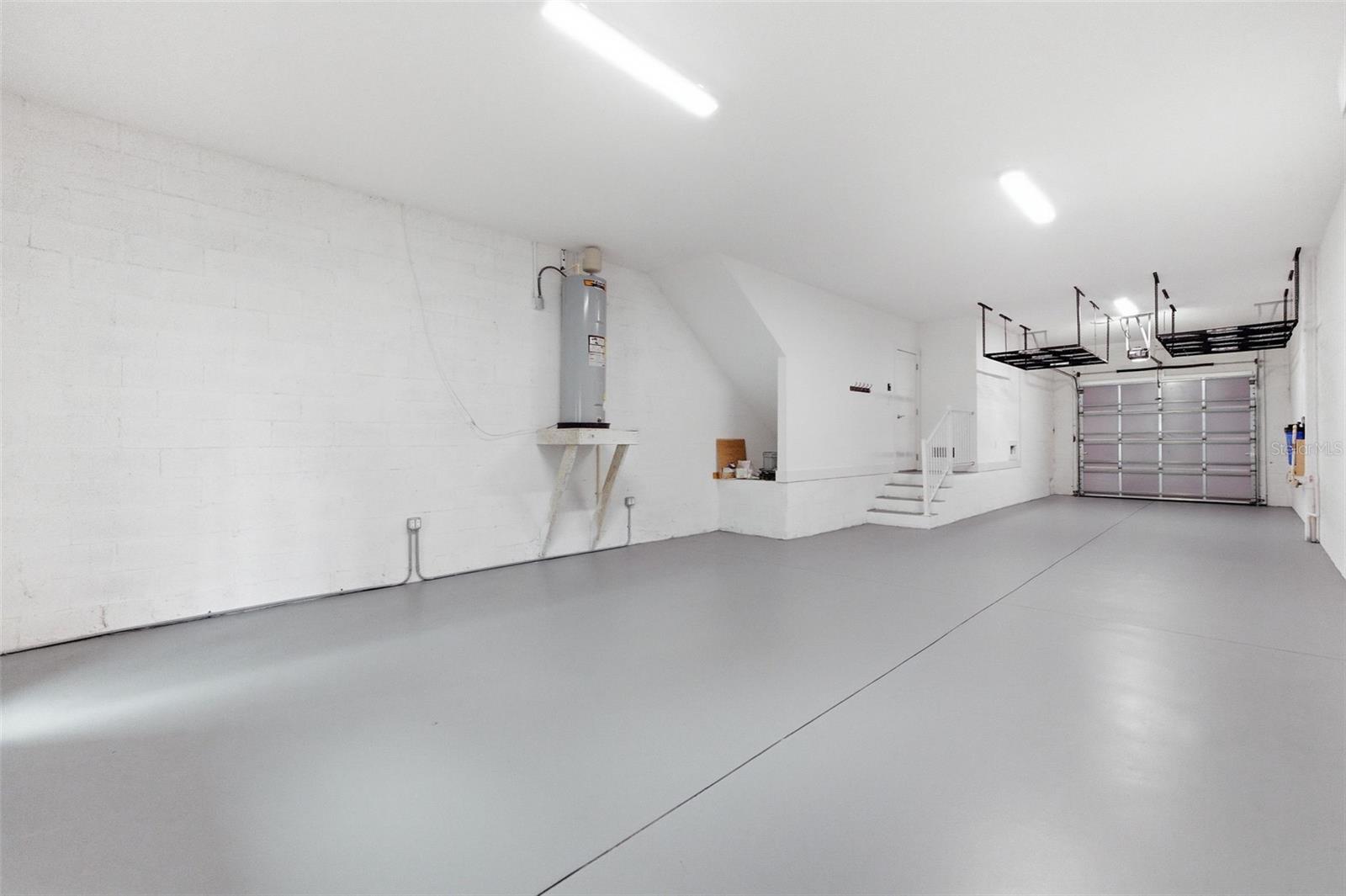 Tandem 4 car garage great for workshop or home gym.