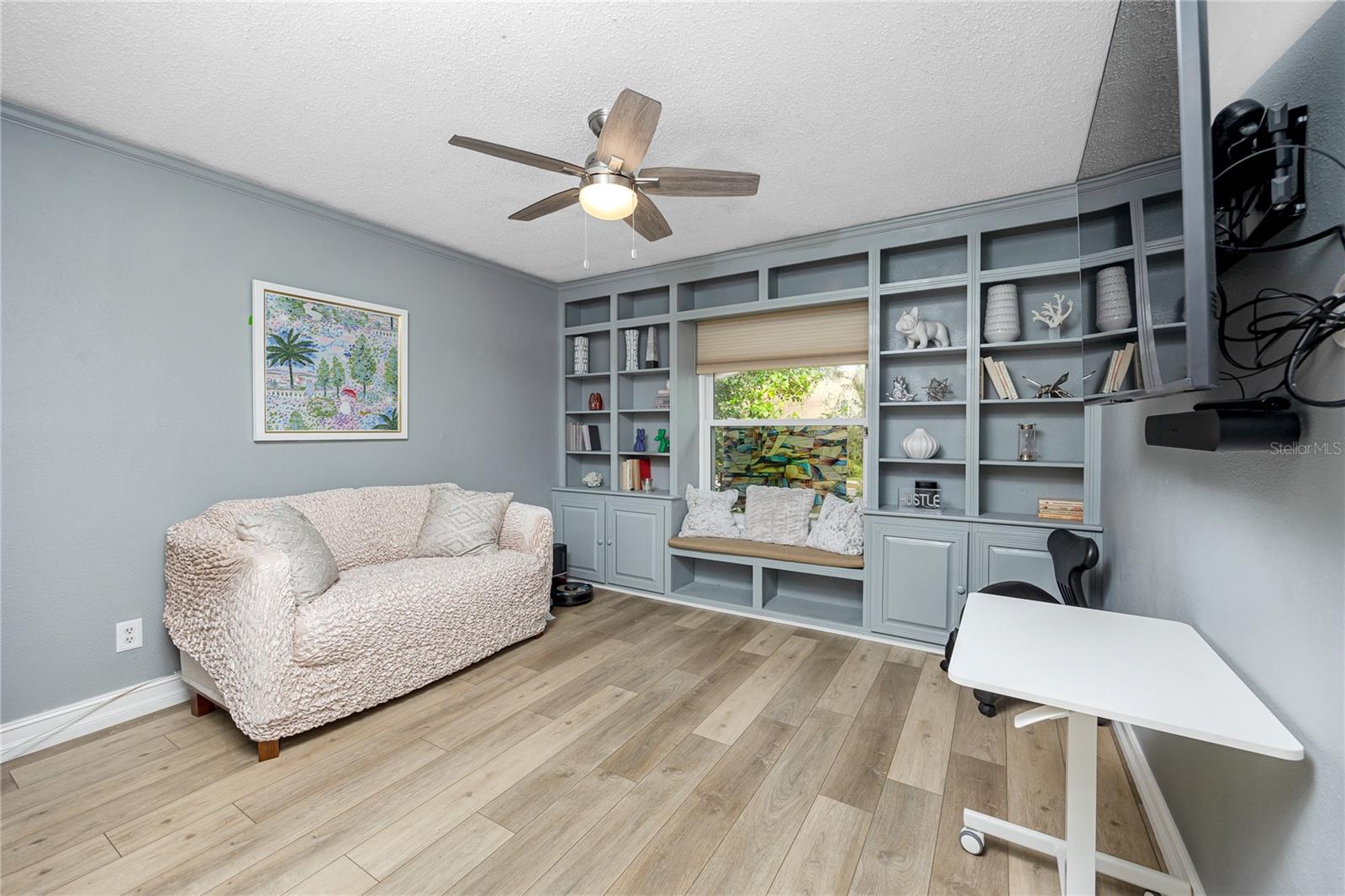 Office with built-in cabinetry and desk area