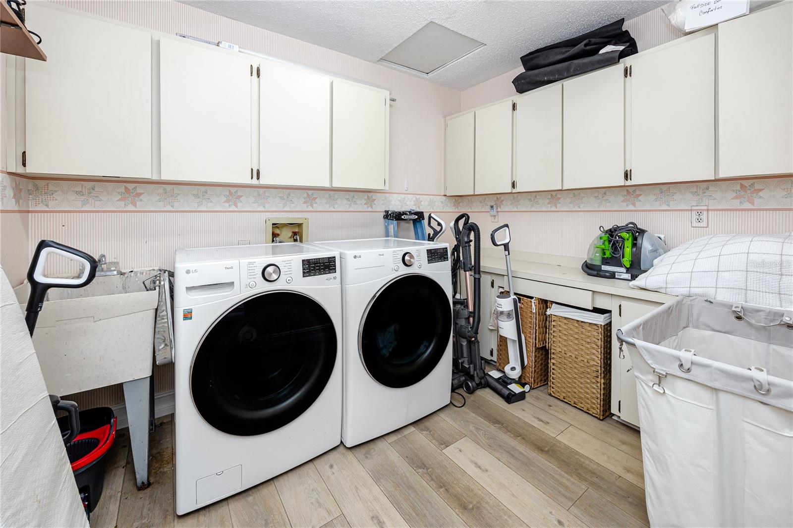 Indoor laundry room with lots of storage