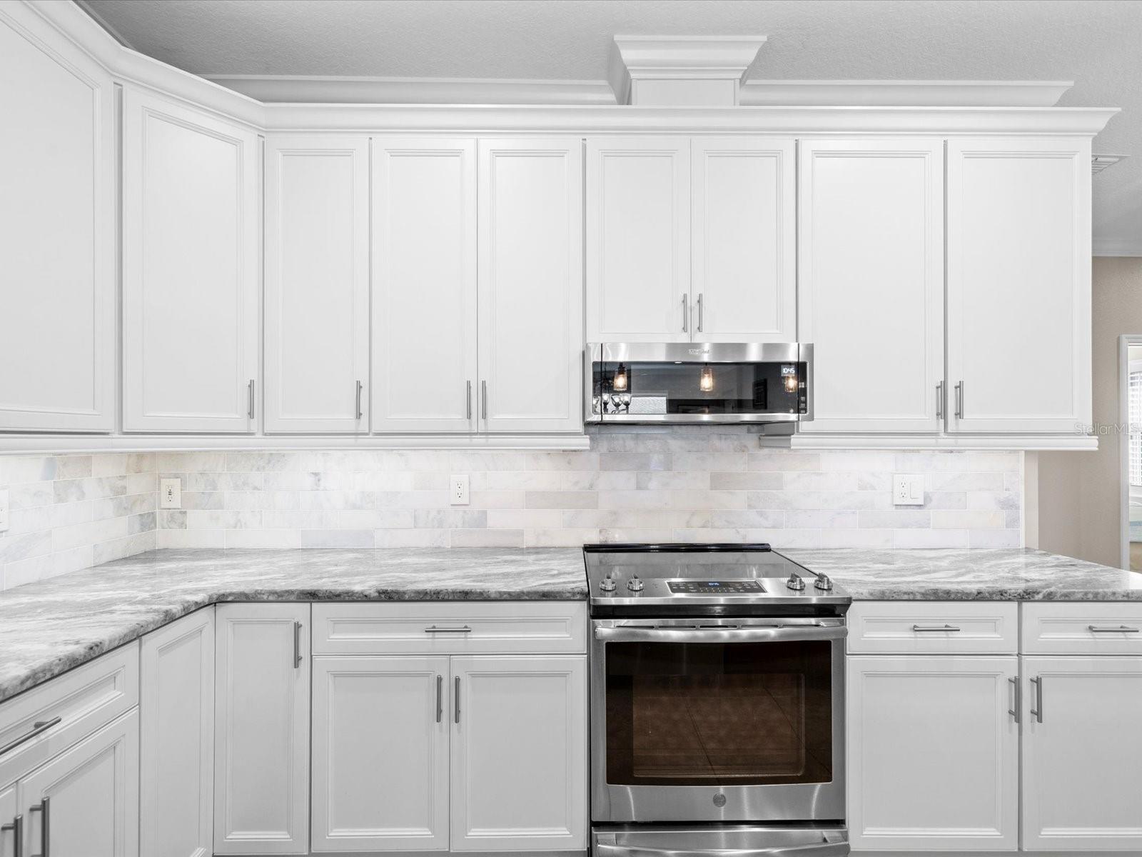 Slide-in range and slim microwave included for your convenience.