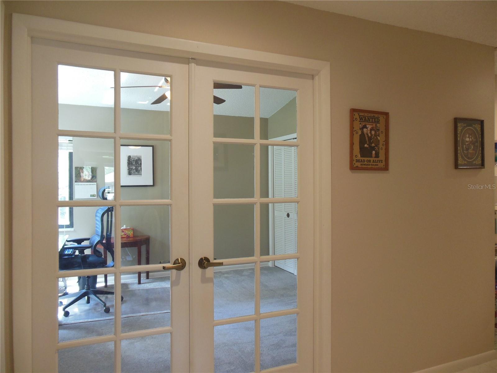 French Doors off hallway to 3rd Bedroom/Den . . .