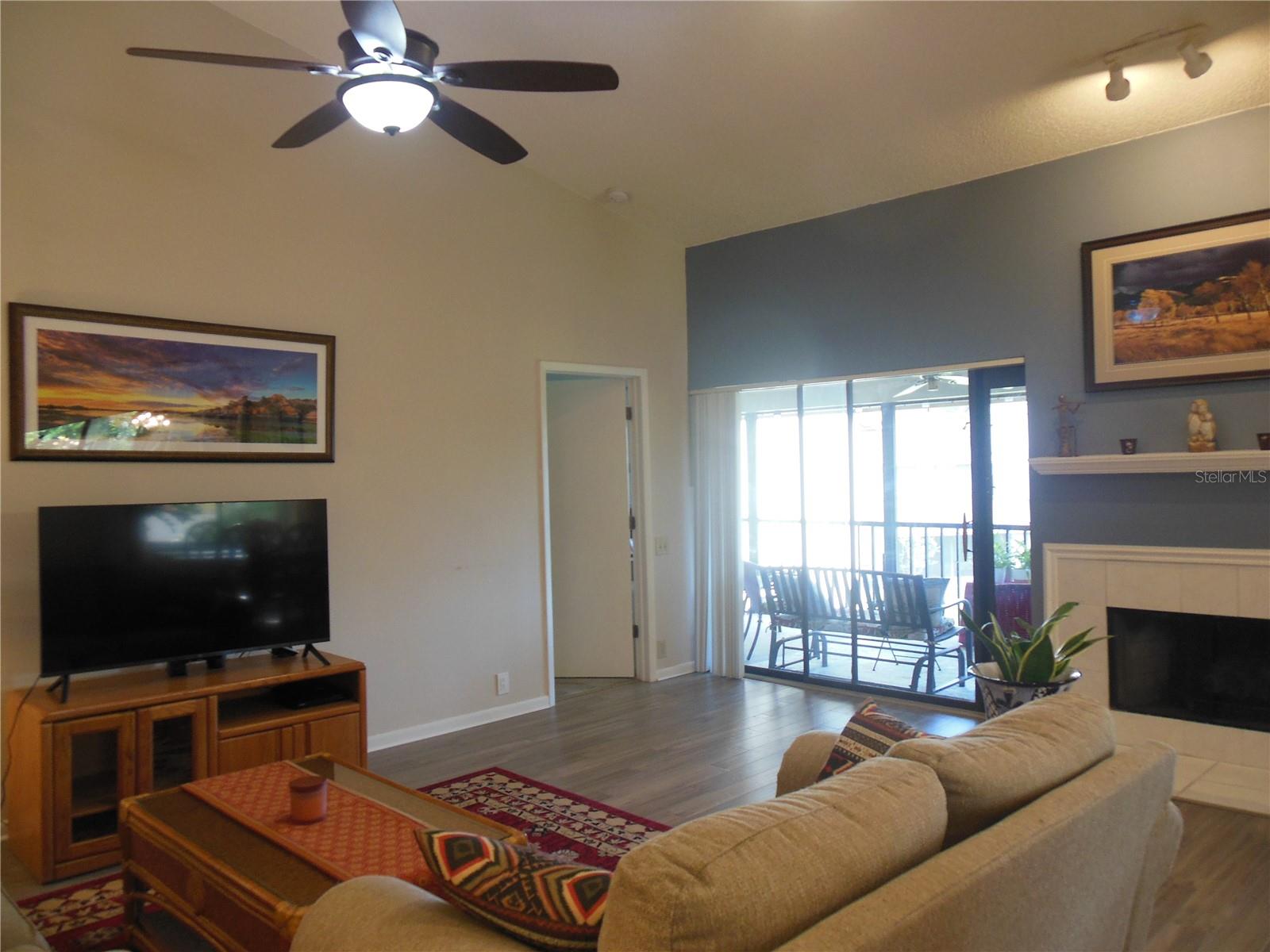 Great room with glass sliders to Lanai/Florida room . ..