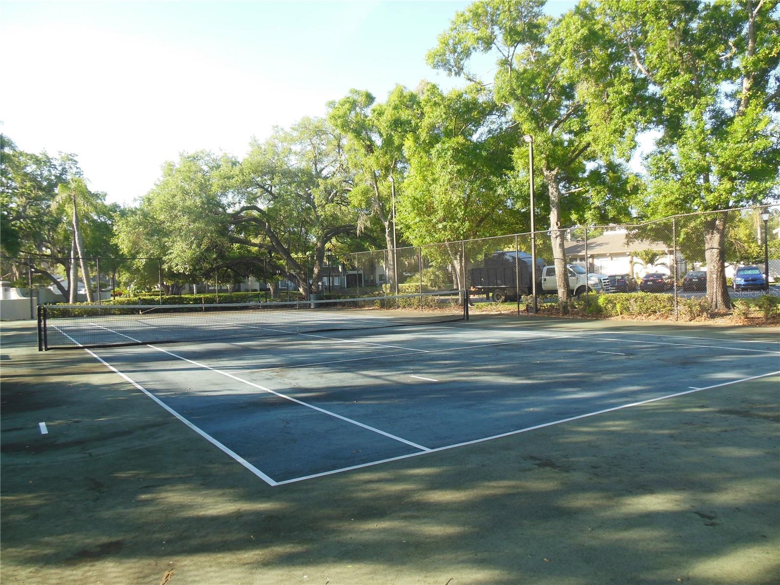 Community Lighted Tennis Court . . .