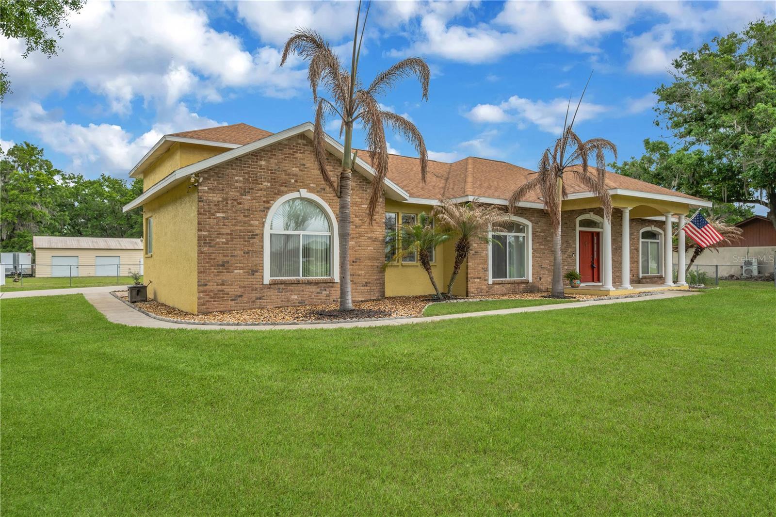 3 bed 2 bath + Pool + Bonus Room + 1,500 sq ft detached garage/workshop on over 1 acre with no HOA or CDD Fees.