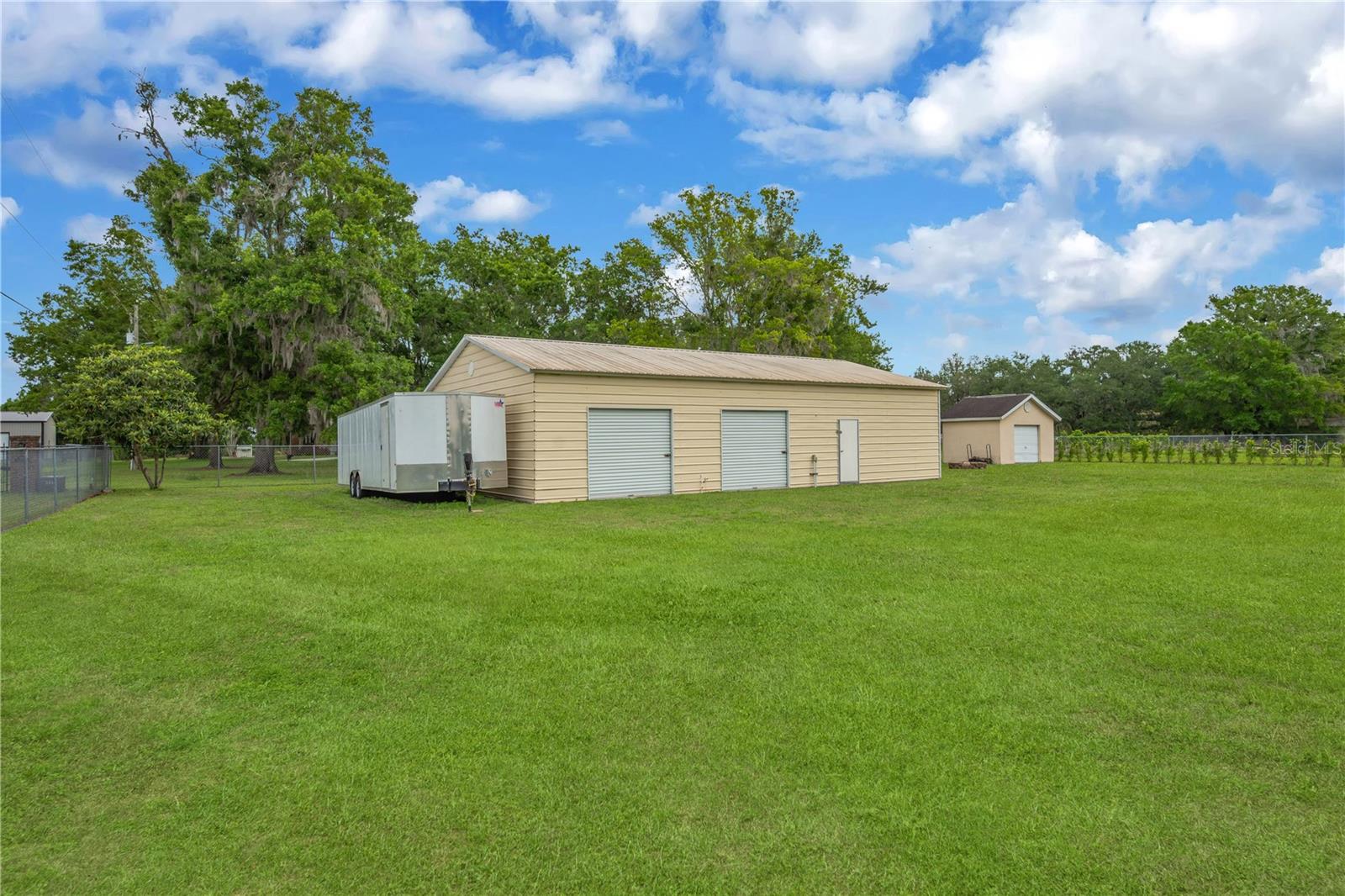 Closer look at 1500 square foot detached garage and the detached single bay garage