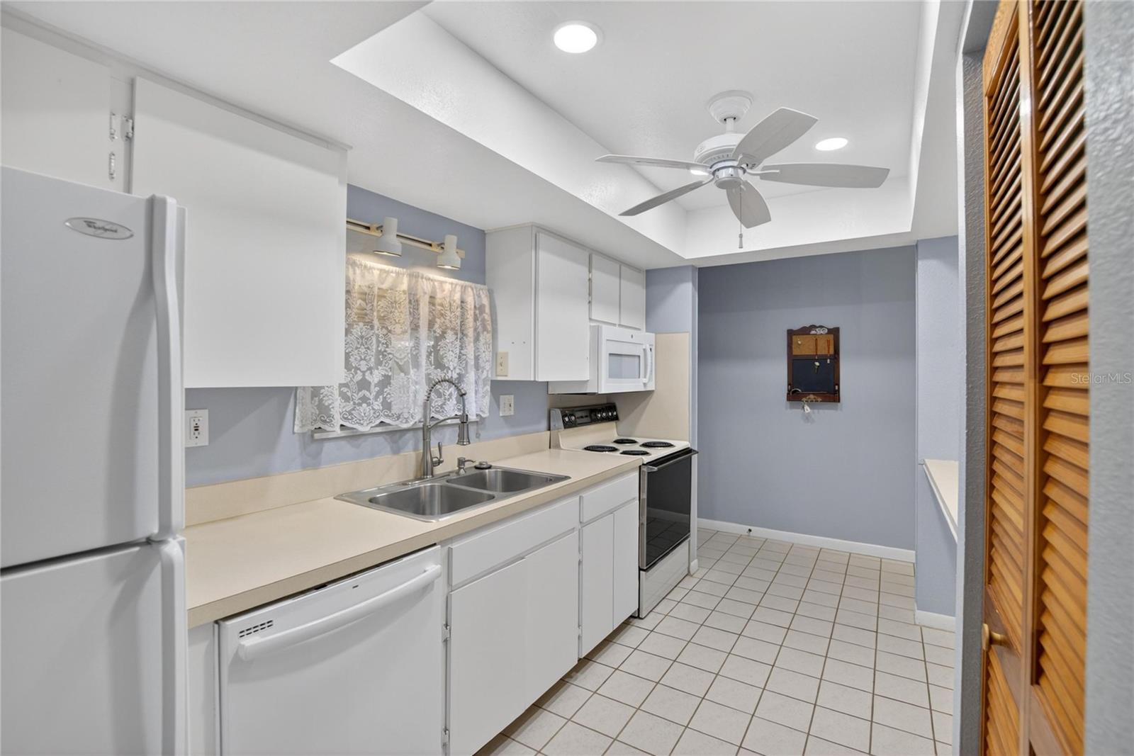 kitchen with pass though to back lanai