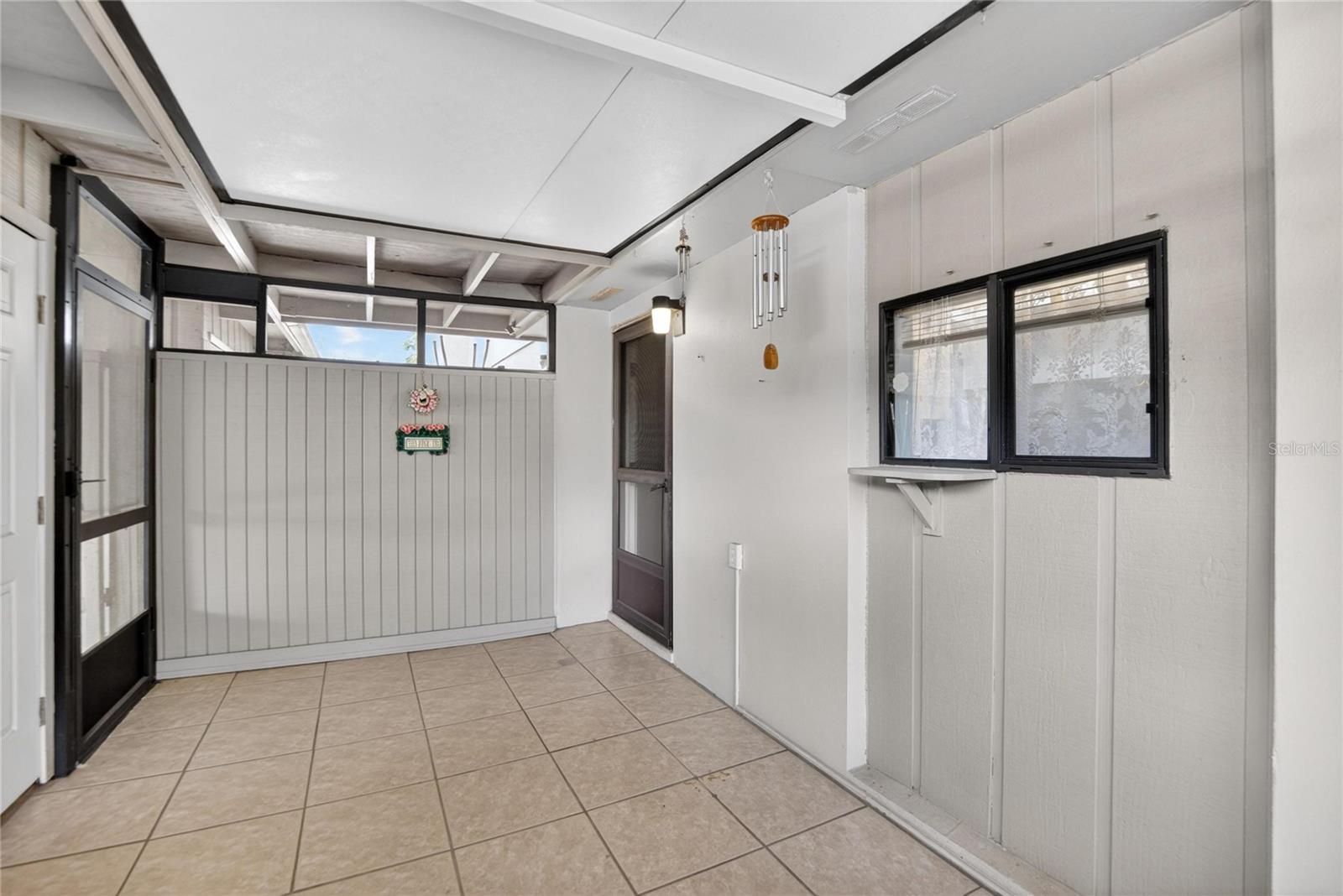 rear lanai with pass through window to kitchen