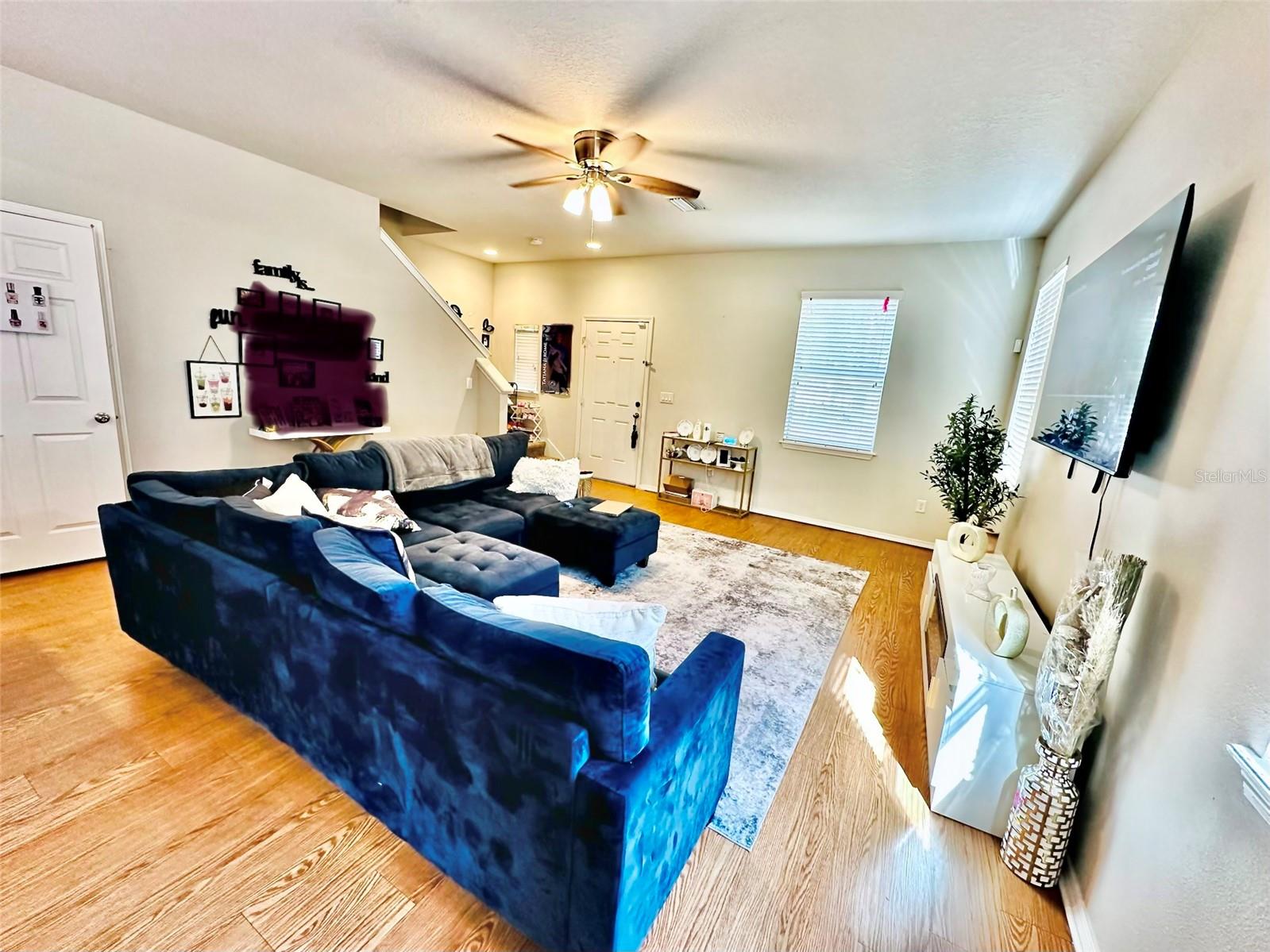 Living Room Area  (family photos blurred)