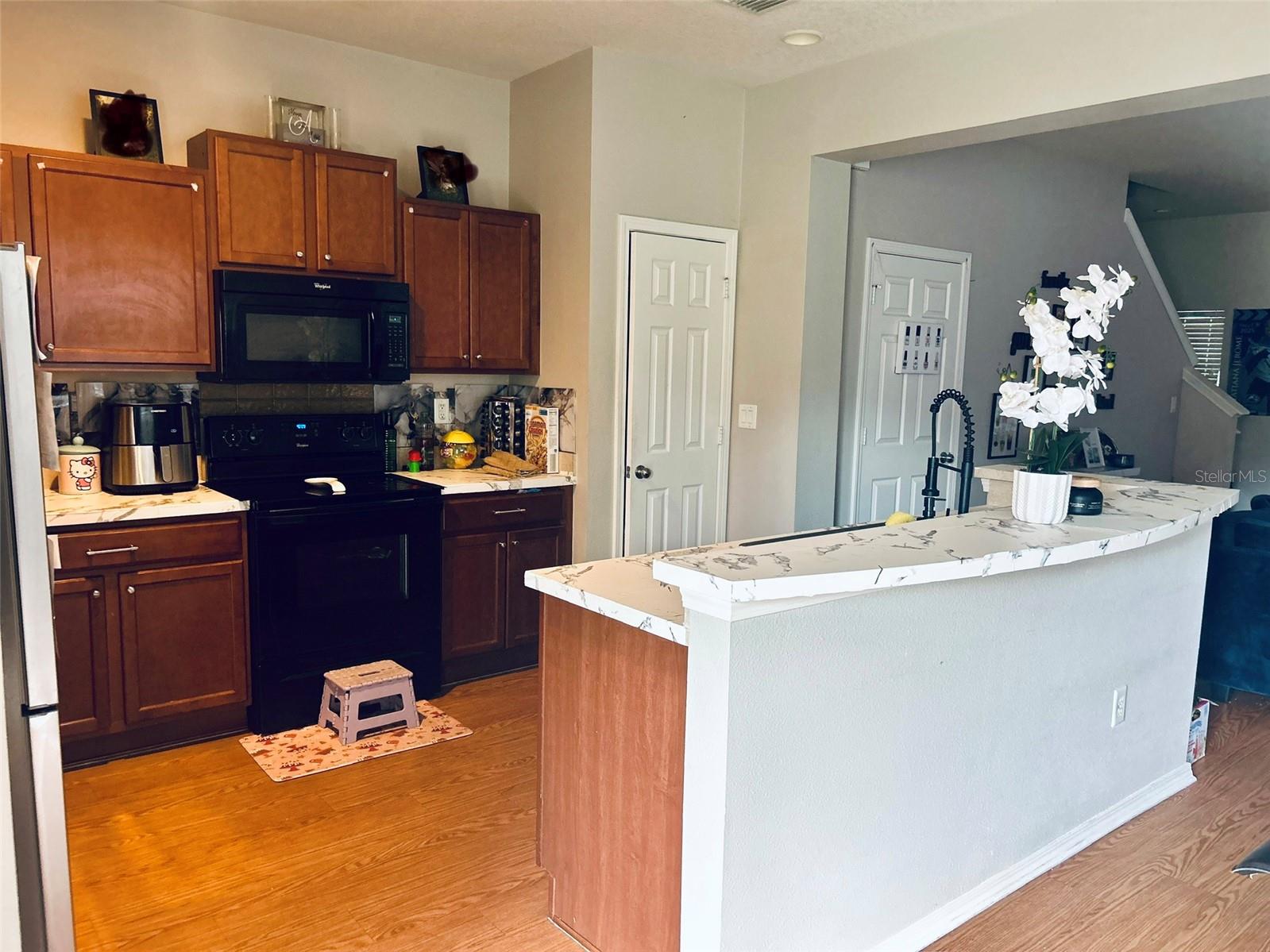 Kitchen                 (family photos blurred)