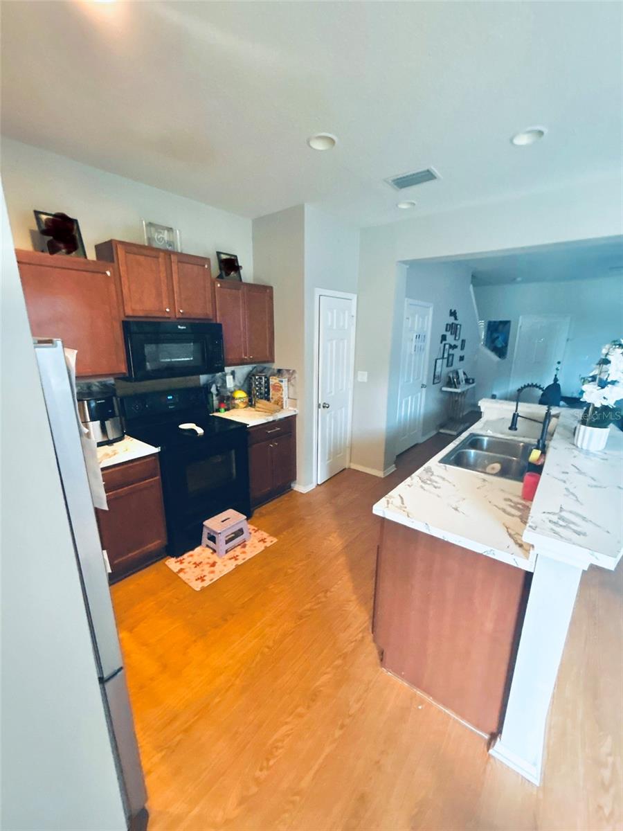 Kitchen                 (family photos blurred)