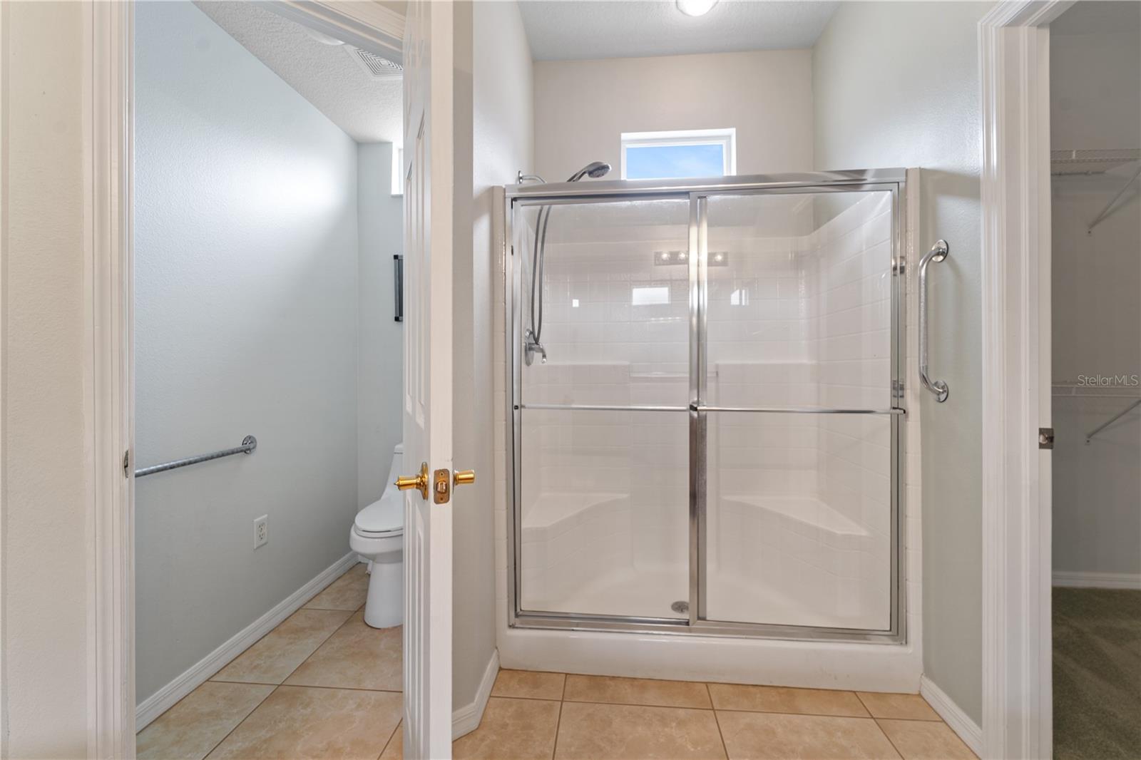 Primary Bath Featuring Standalone Showe