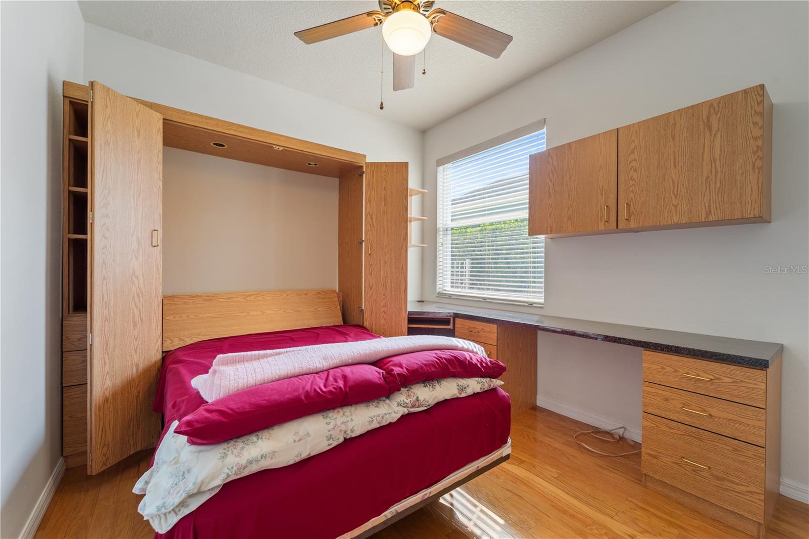 Versatile Bedroom with Murphy Bed and Built-In Desk