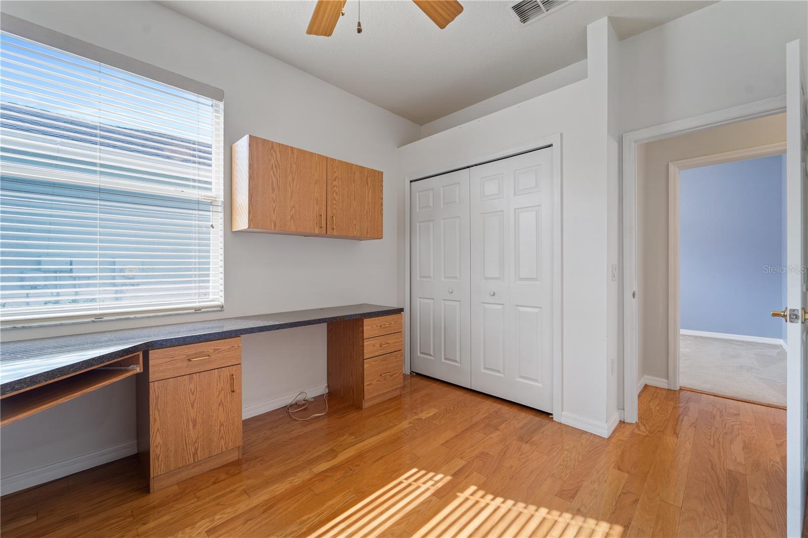 Versatile Bedroom with Murphy Bed and Built-In Desk