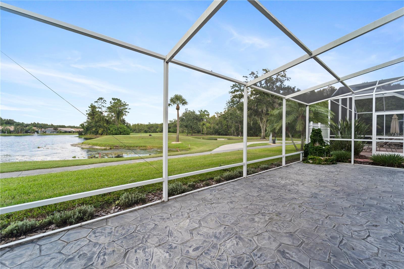 Screened Patio with Stunning Golf & Water Views
