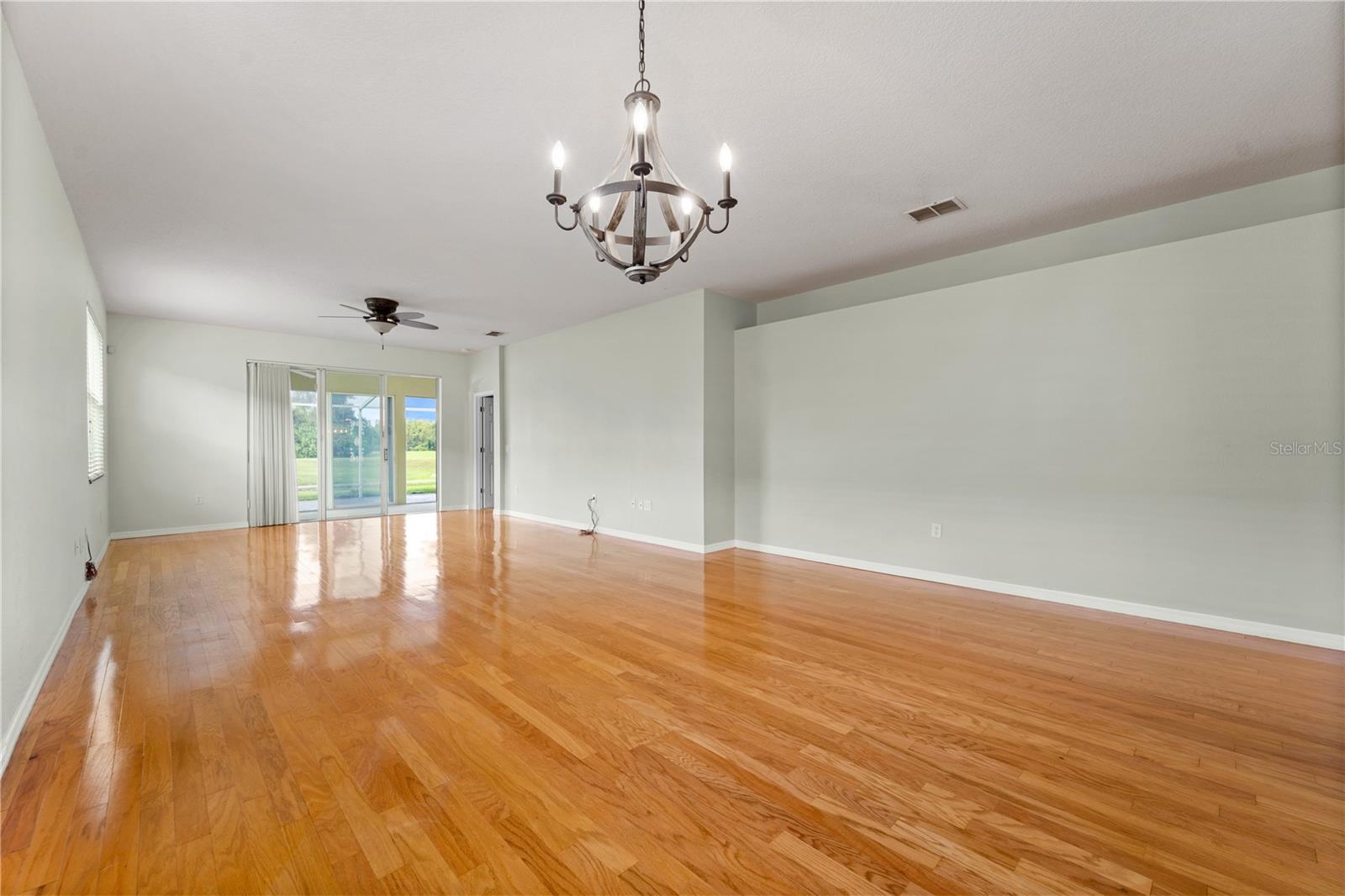 Dining & Great Room with Unobstructed Golf & Water Views