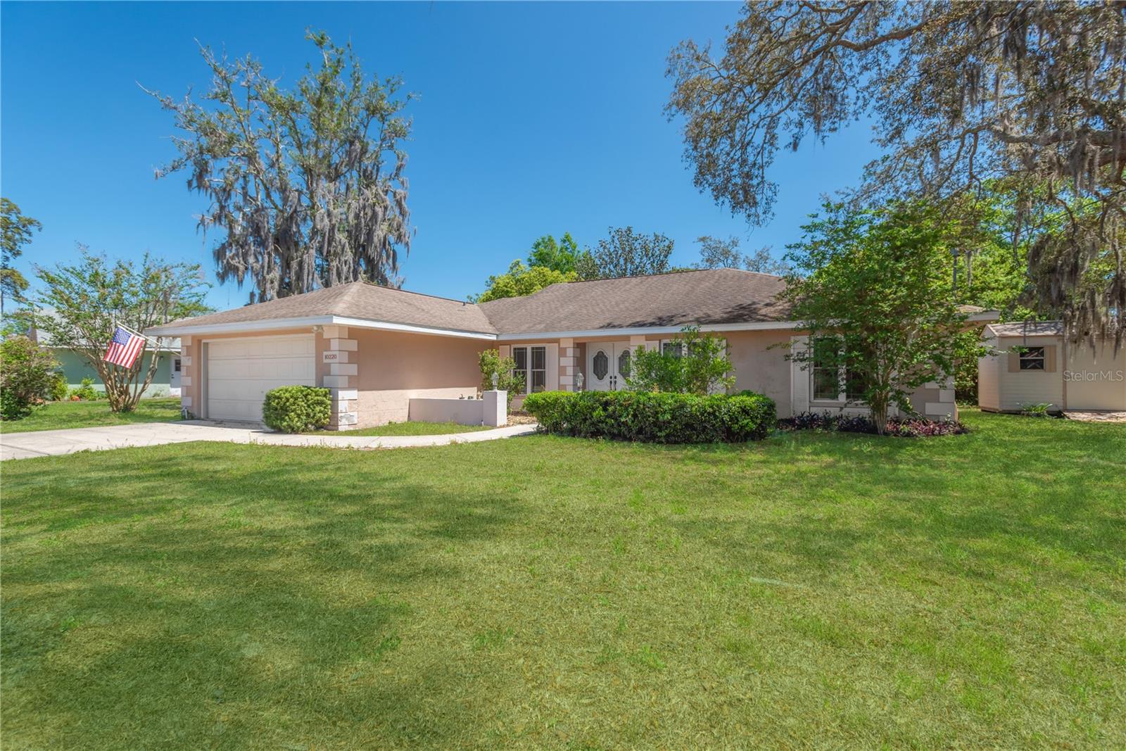 Alternate front view to showcase amount of greenspace for this home.