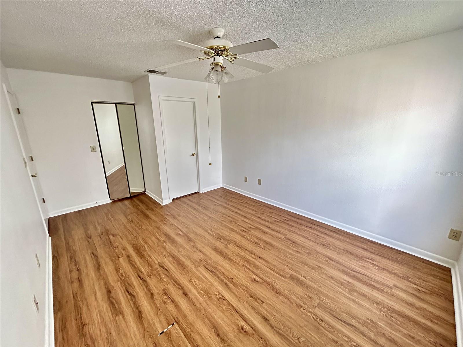 Primary bed[room with walk-in closet
