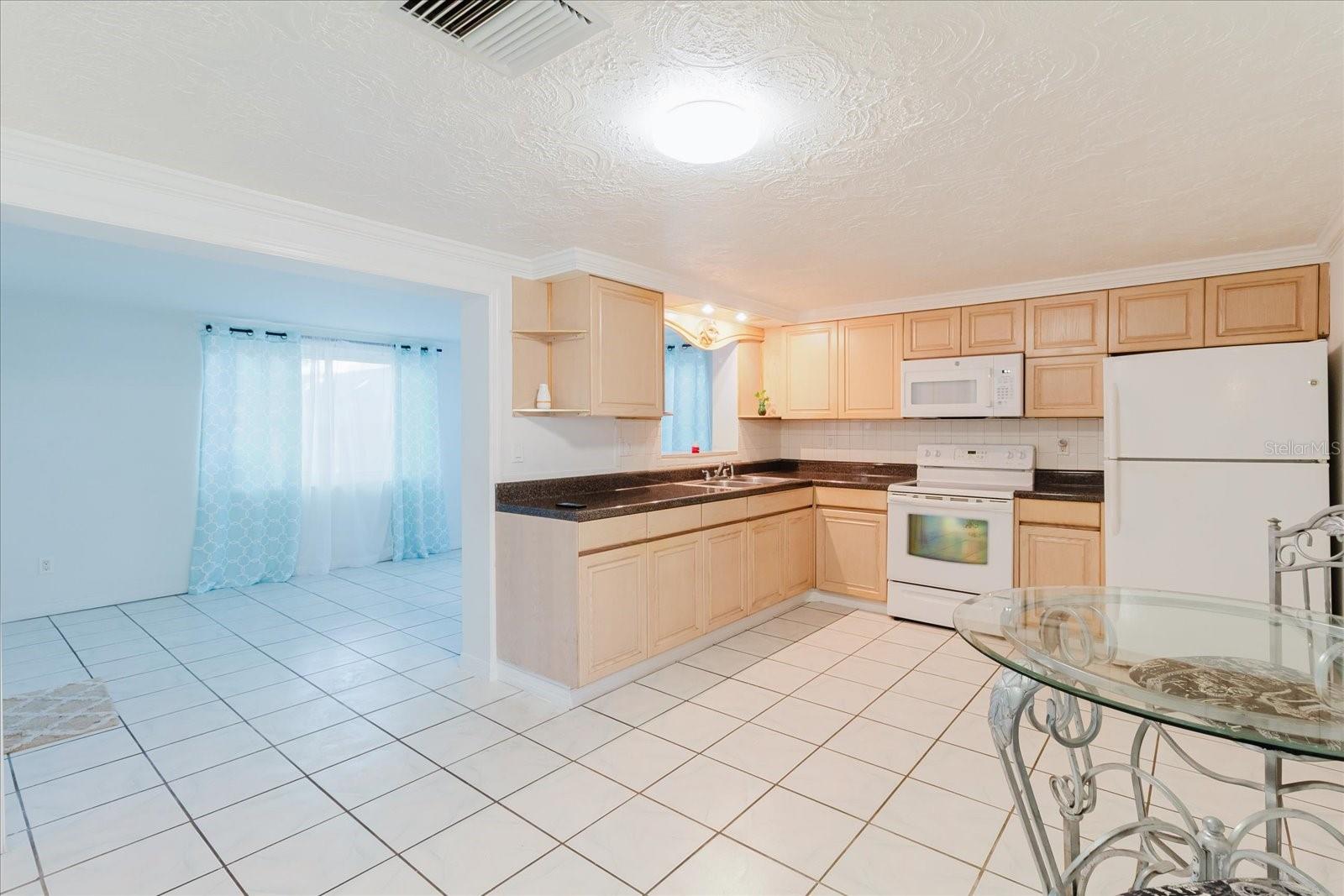 View From The Living Room To The Bonus Room and The Kitchen