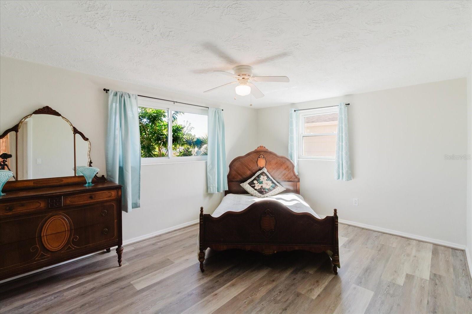 View Of The Primary Bedroom In FRont Of The Closet