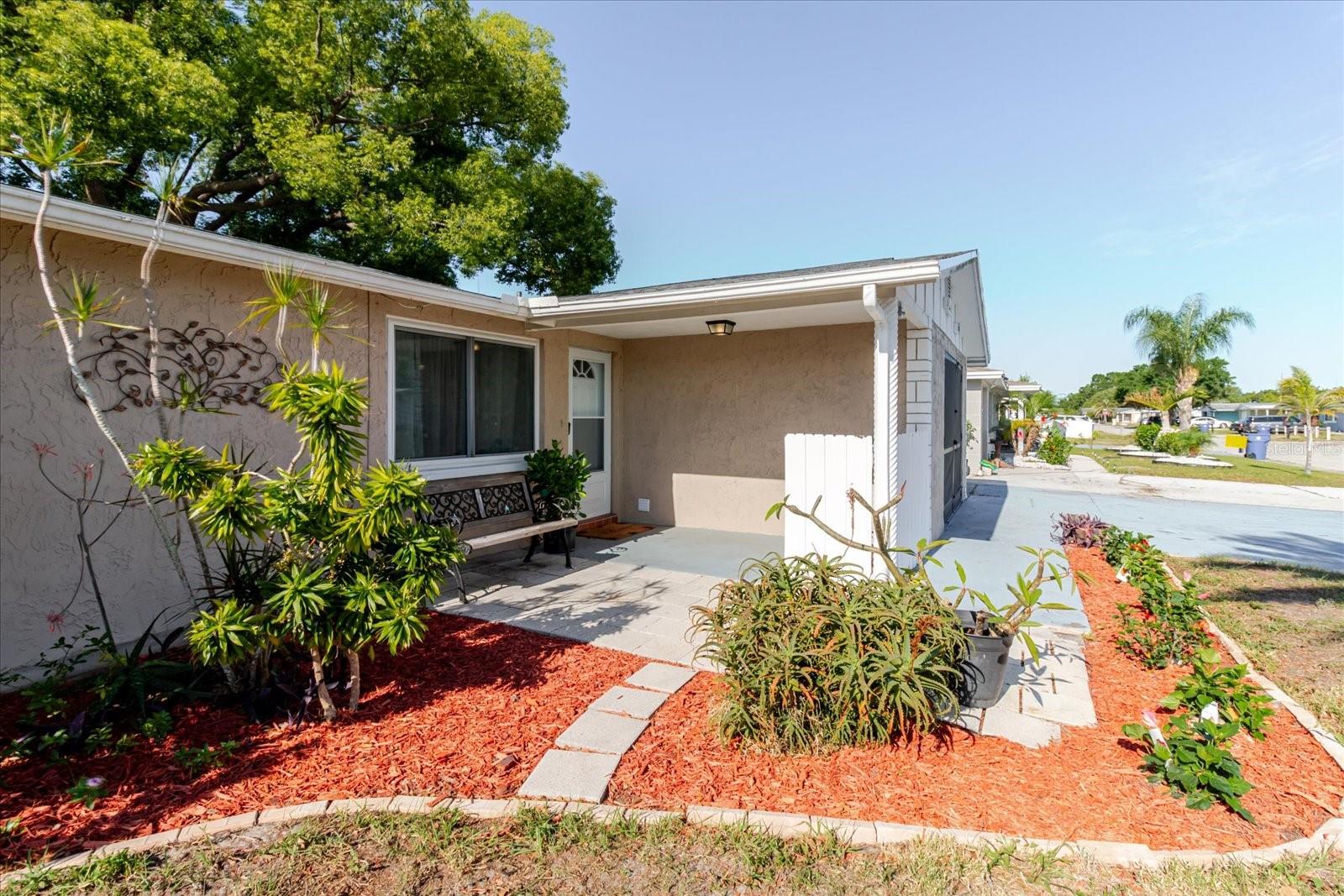 A View Of The Front Entrance From Left Side Of The Front Yard