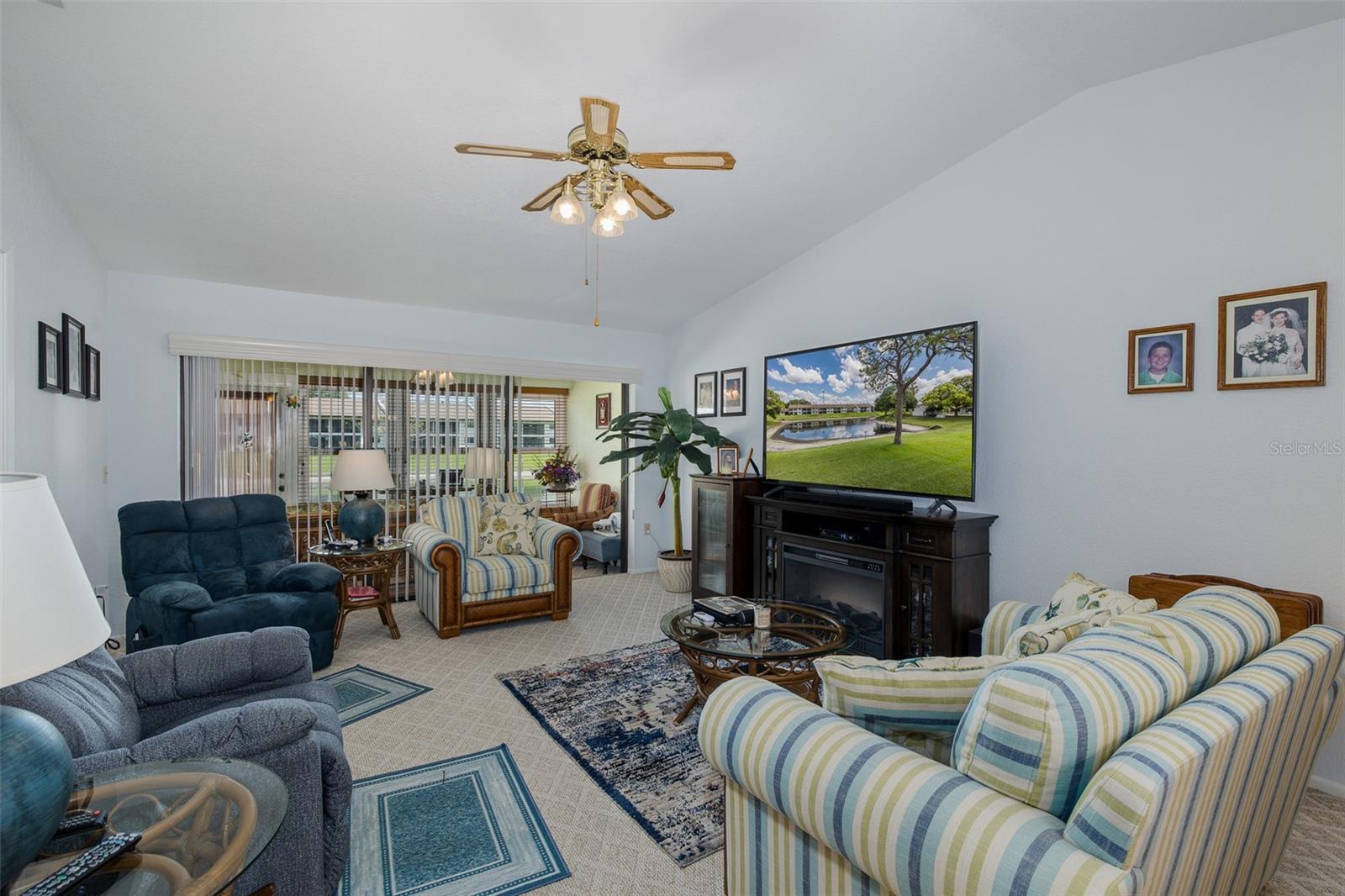 Living room with vaulted ceilings