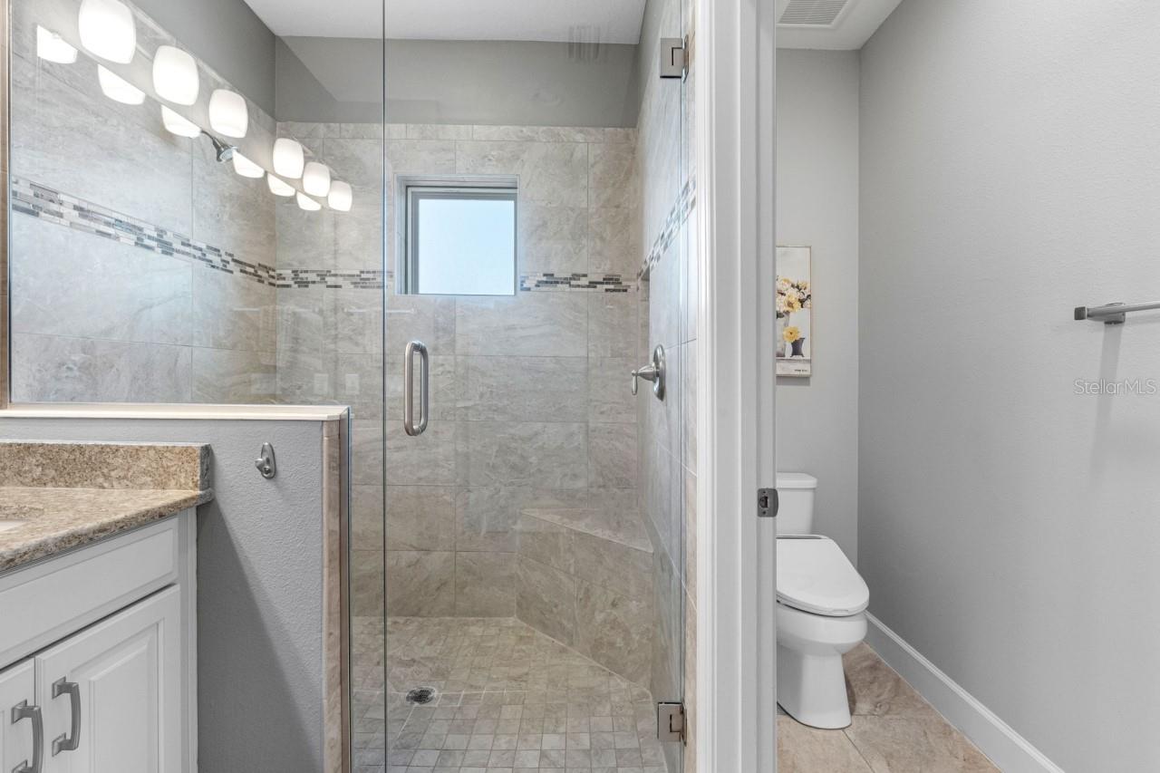 Split layout, with the toilet tucked into its own private water closet for added privacy and comfort.