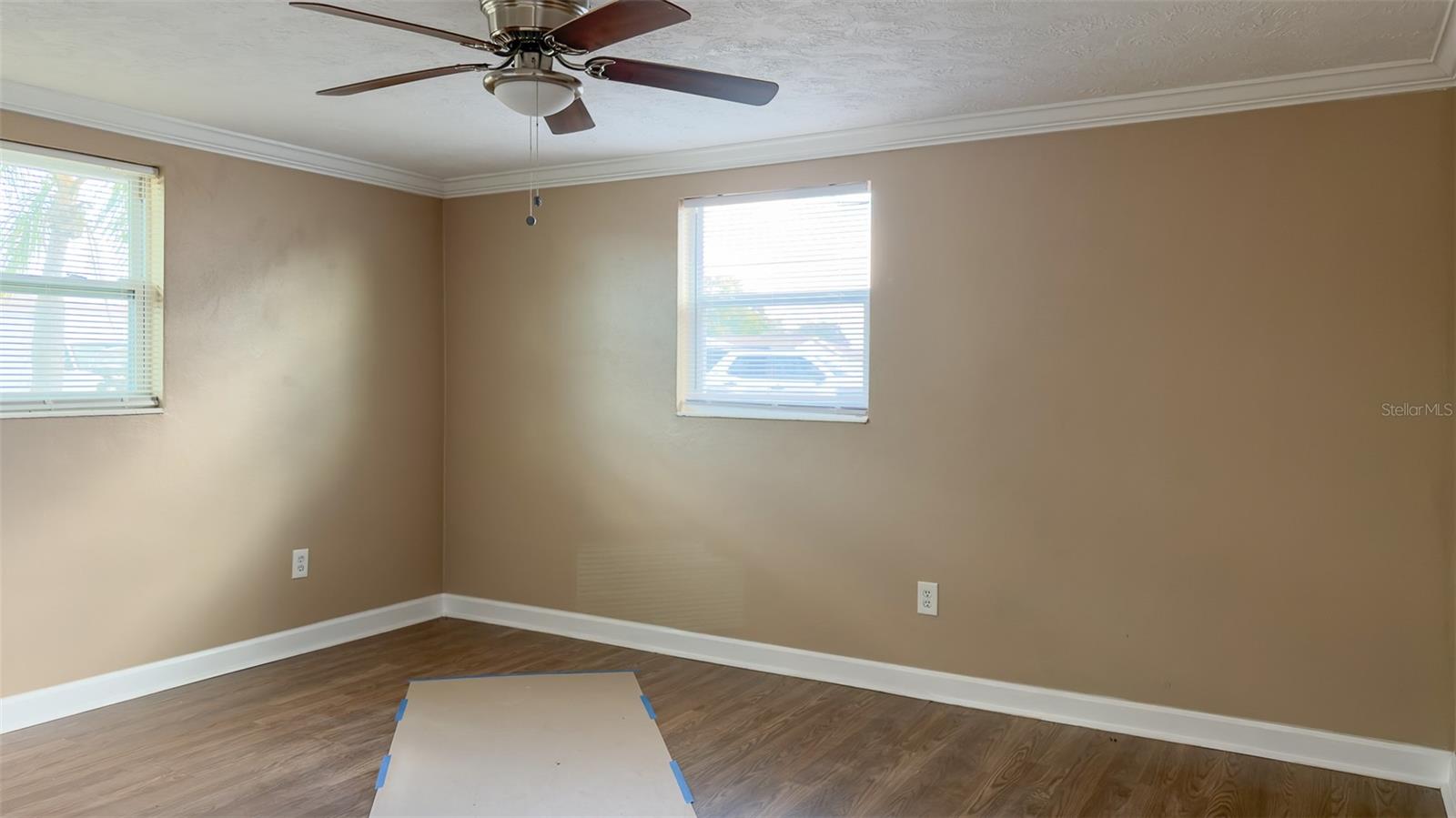 Comfortable primary retreat with generous closet space and a peaceful atmosphere.