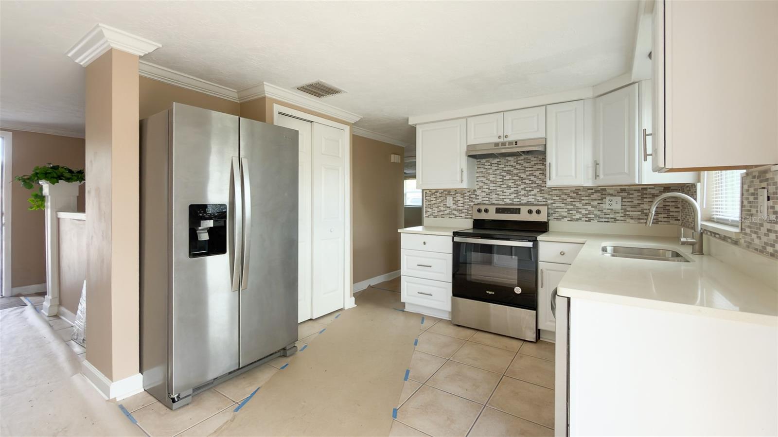 Light-filled kitchen offering both function and modern design for everyday cooking.