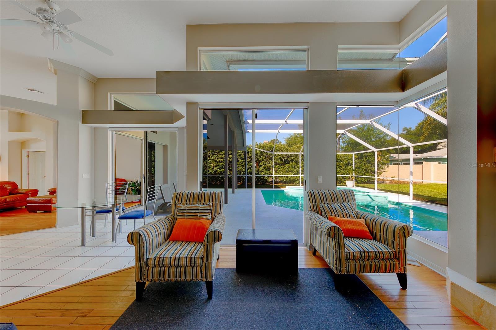 Light and bright family room with plenty of windows for natural light