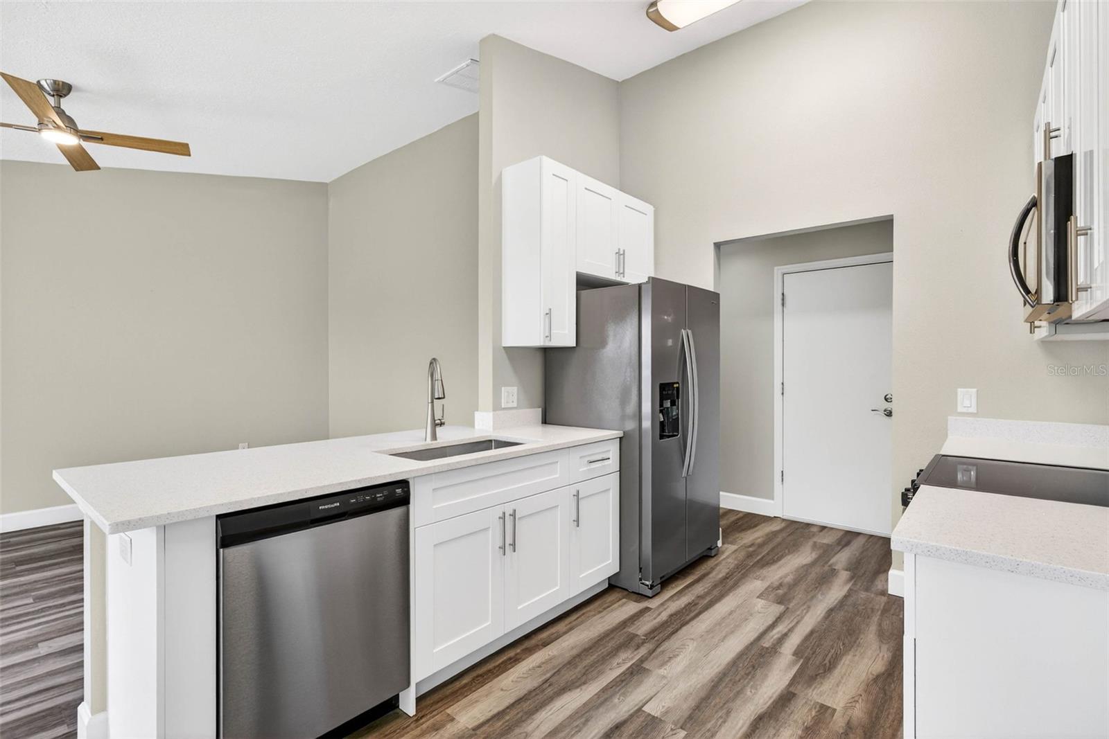 View looking into Den/Flex Room from breakfast nook