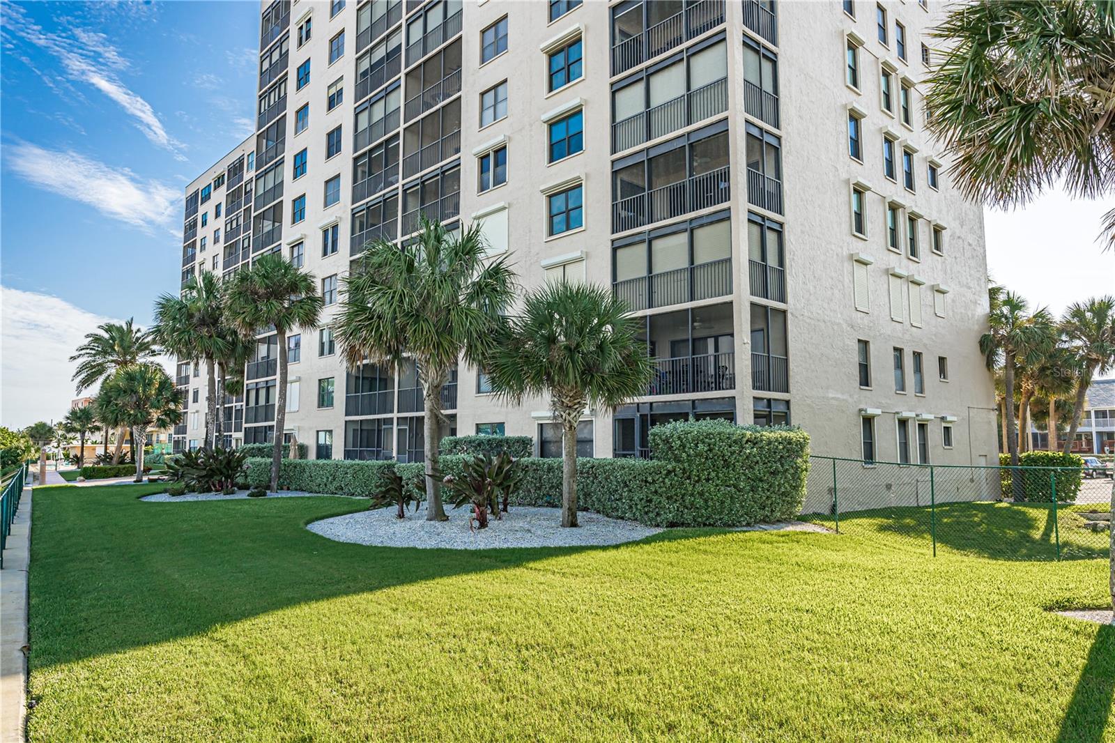 View of the builidng and manicured lawn from Gulf Side