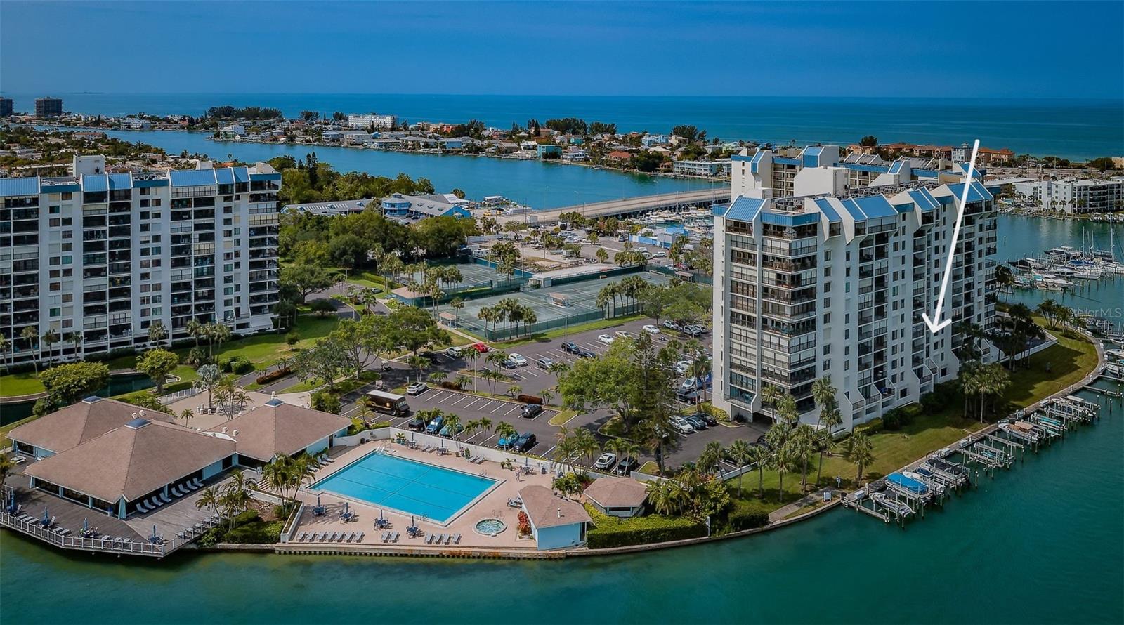 Waterfront Clubhouse & Pool area adjacent to the Intrepid Bldg and Unit 205 for sale