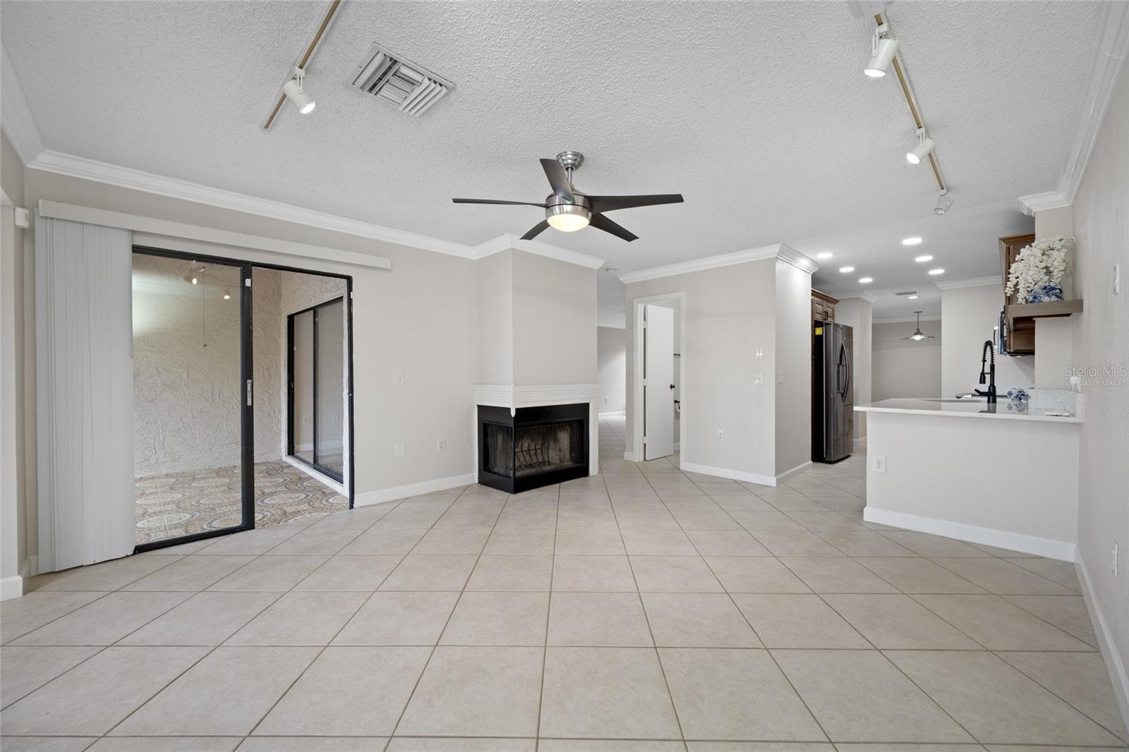 Family & Kitchen with wood burning fireplace