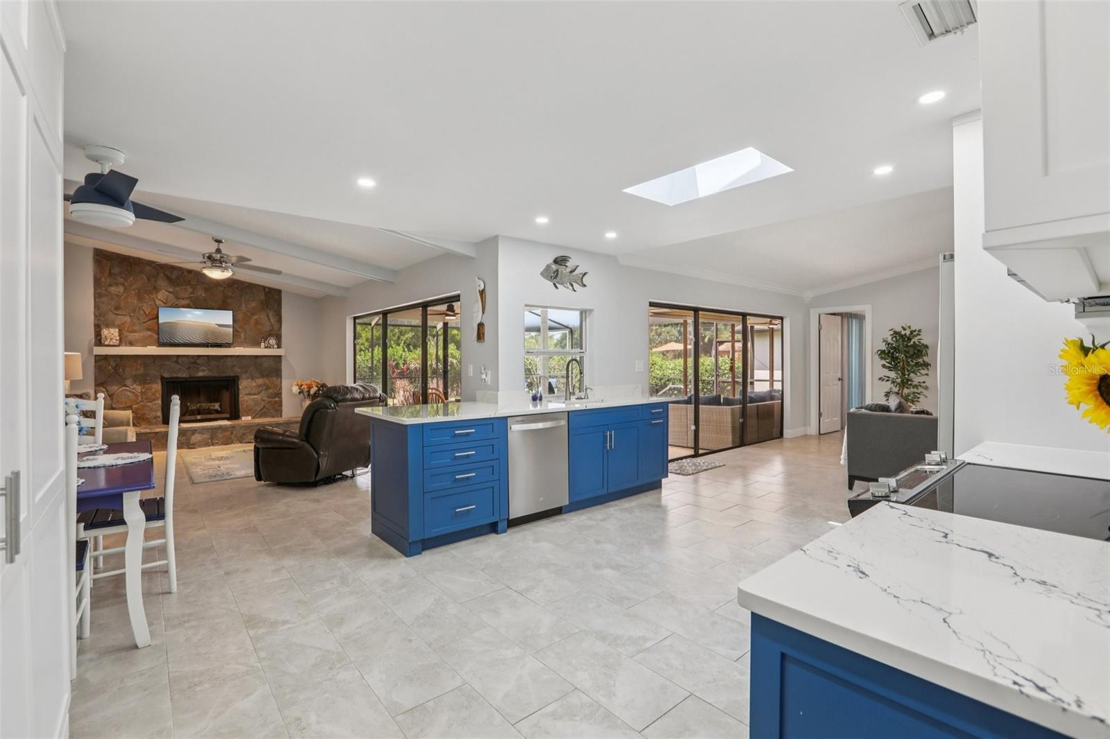 Both sets of triple sliders open 100%, tucking away into the walls, for a seamless transition to the outdoors