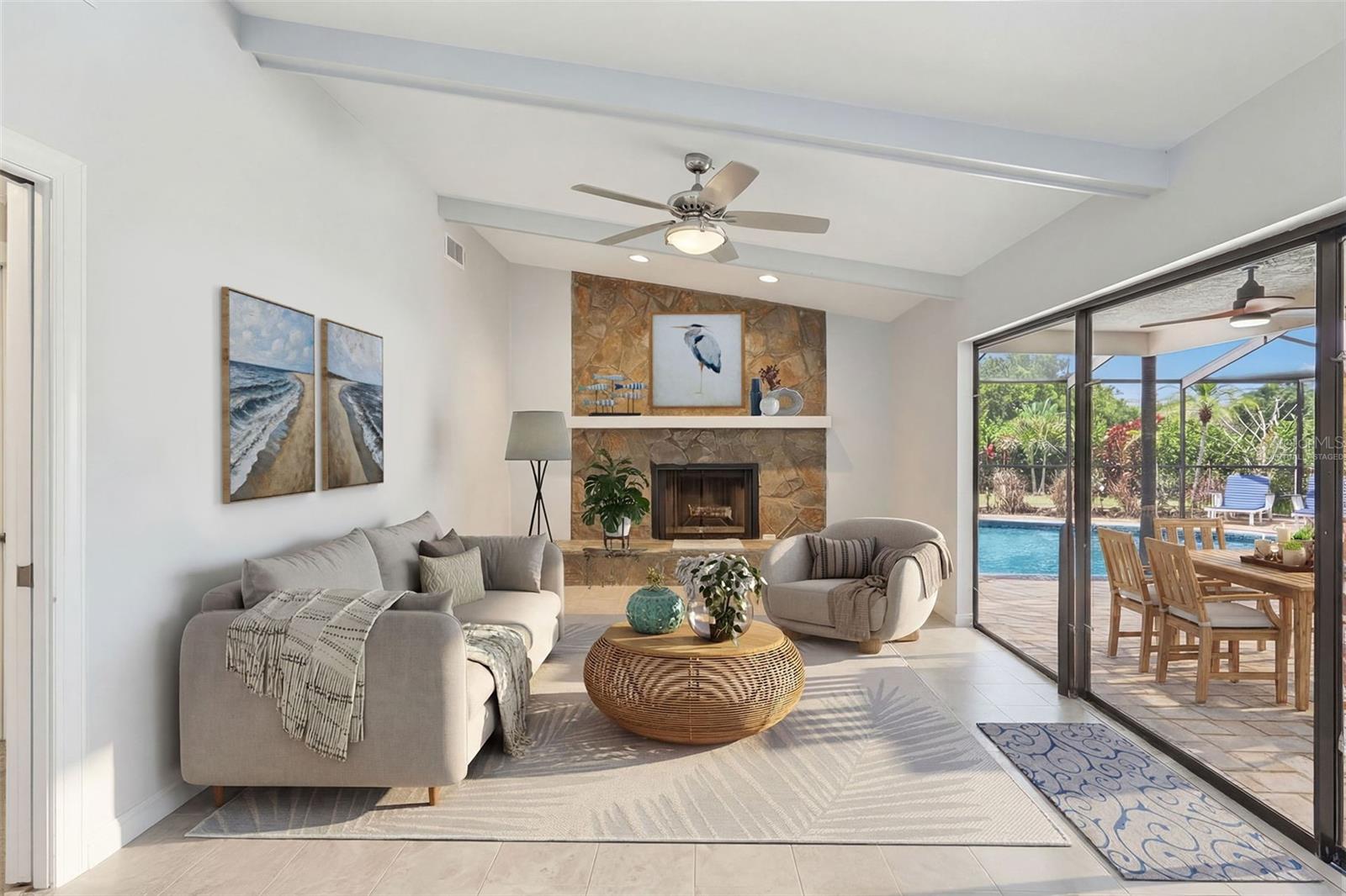 Virtually Staged - Living Room with pocket  sliders that fully open to the lanai