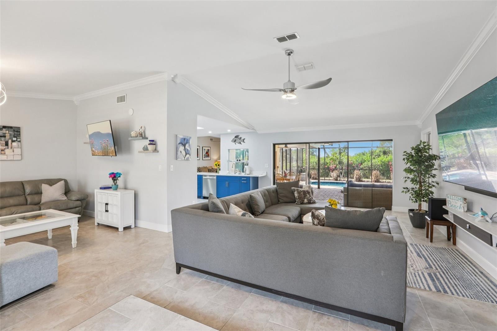 An inviting, light and bright atmosphere welcomes you as you enter the home.