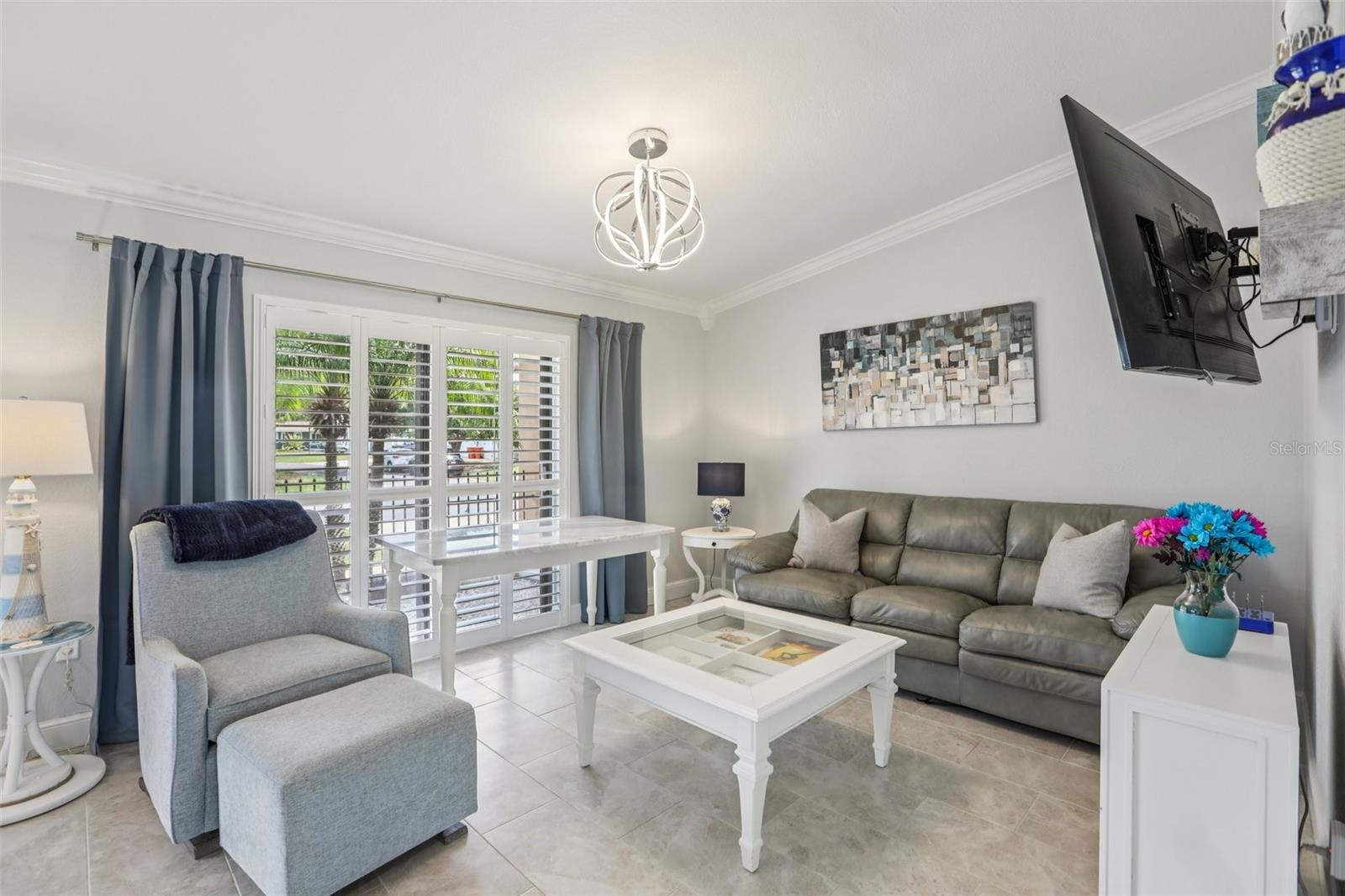 Sitting room for quiet relaxation or conversation that can easily transform into a formal dining area for those who love to entertain.