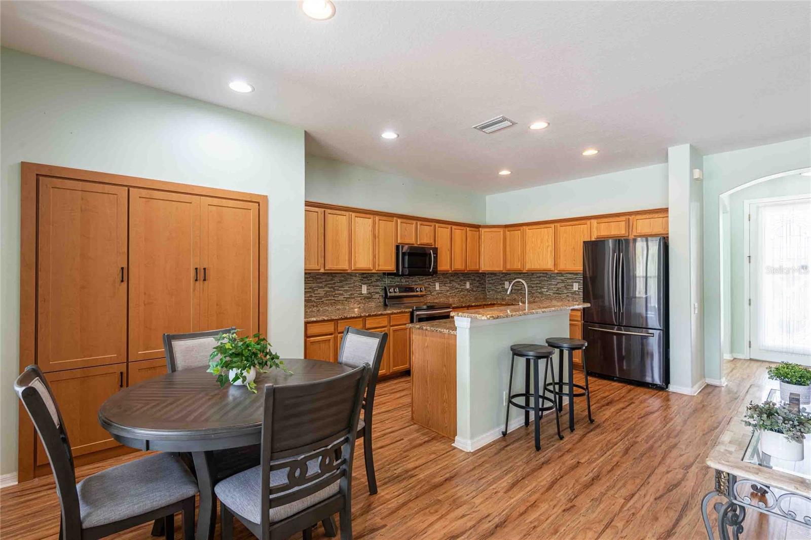 Large kitchen with new built-in pantry.