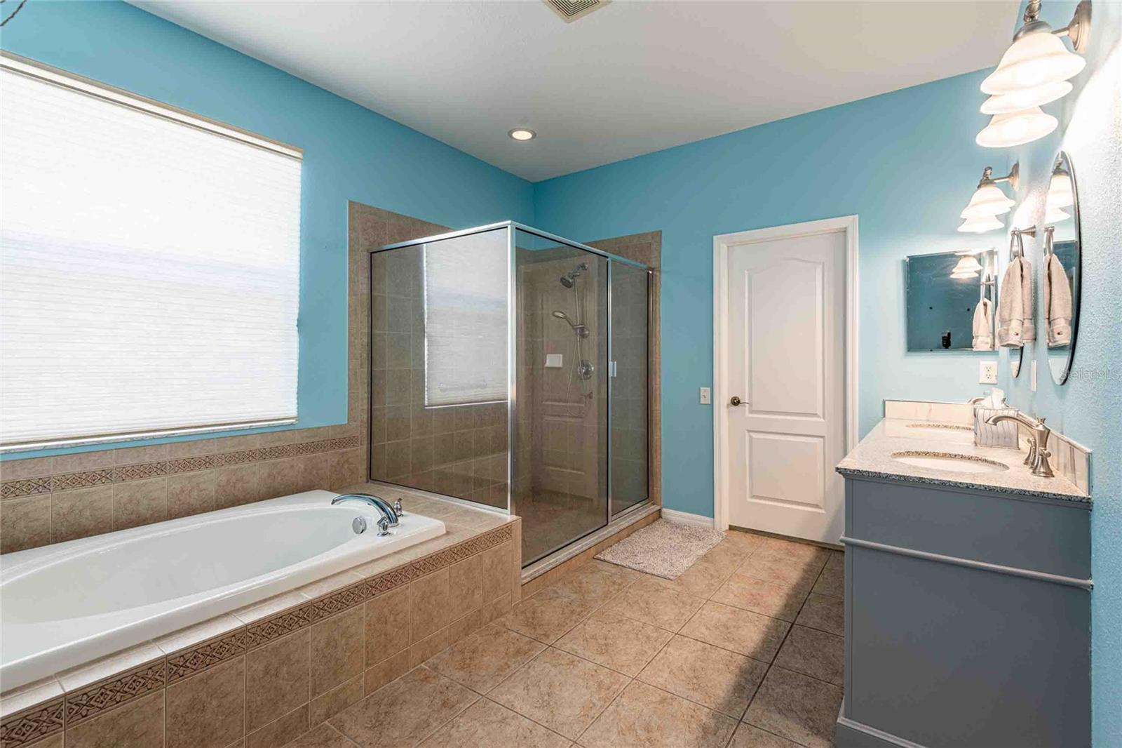 The door leads to a large walk-in closet.