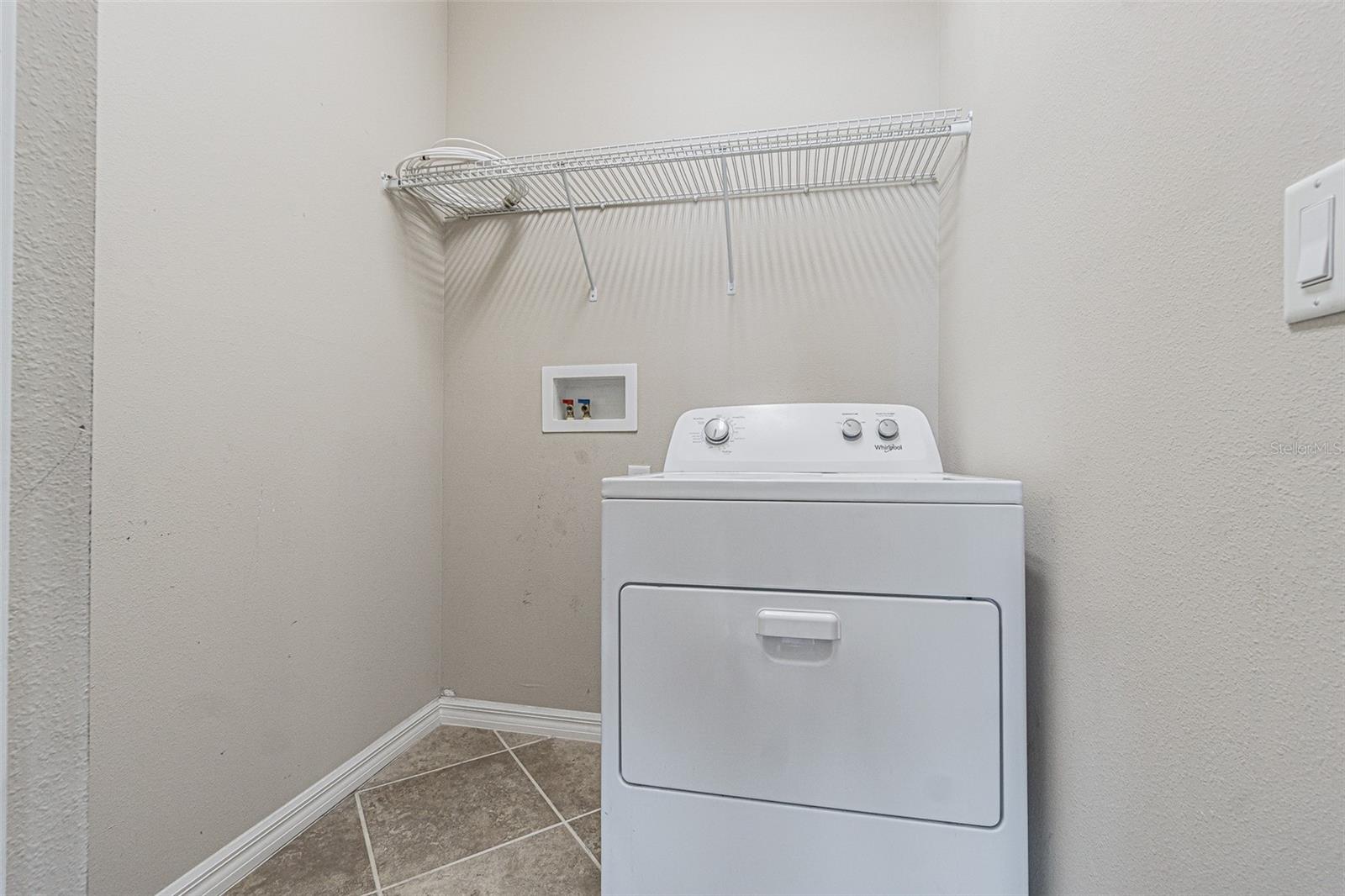 Inside laundry, NO WASHER.