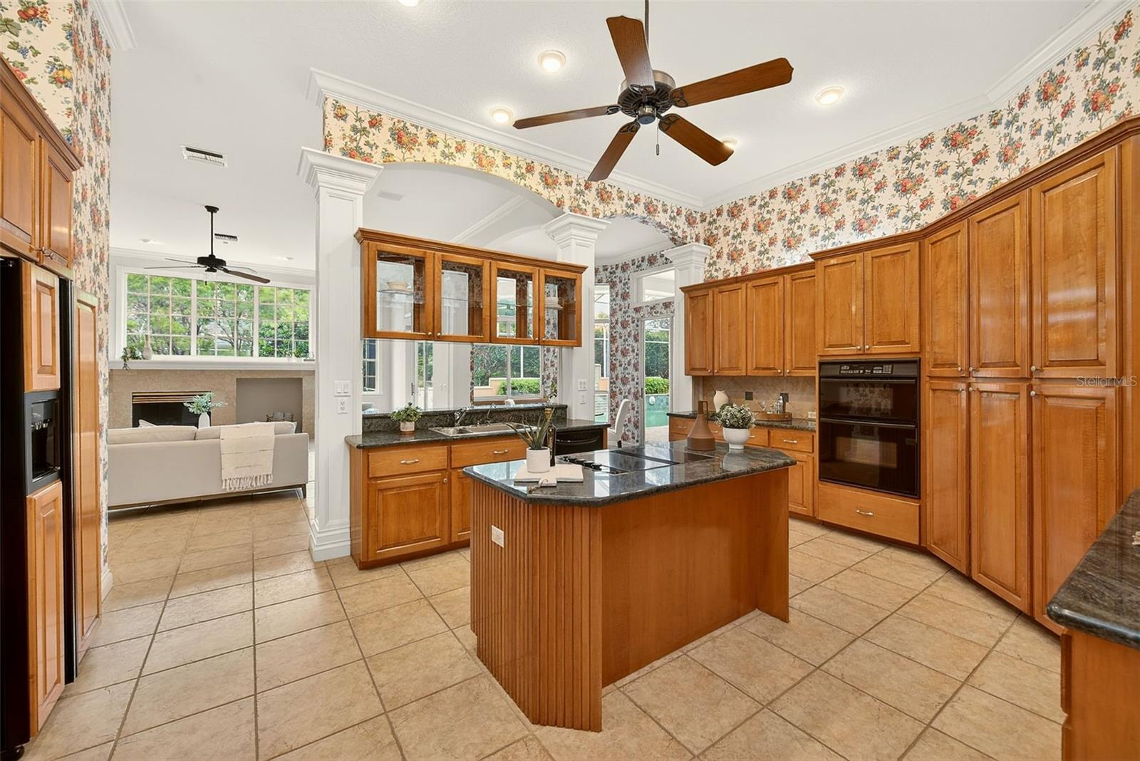 Open Kitchen with custom cabinetry.